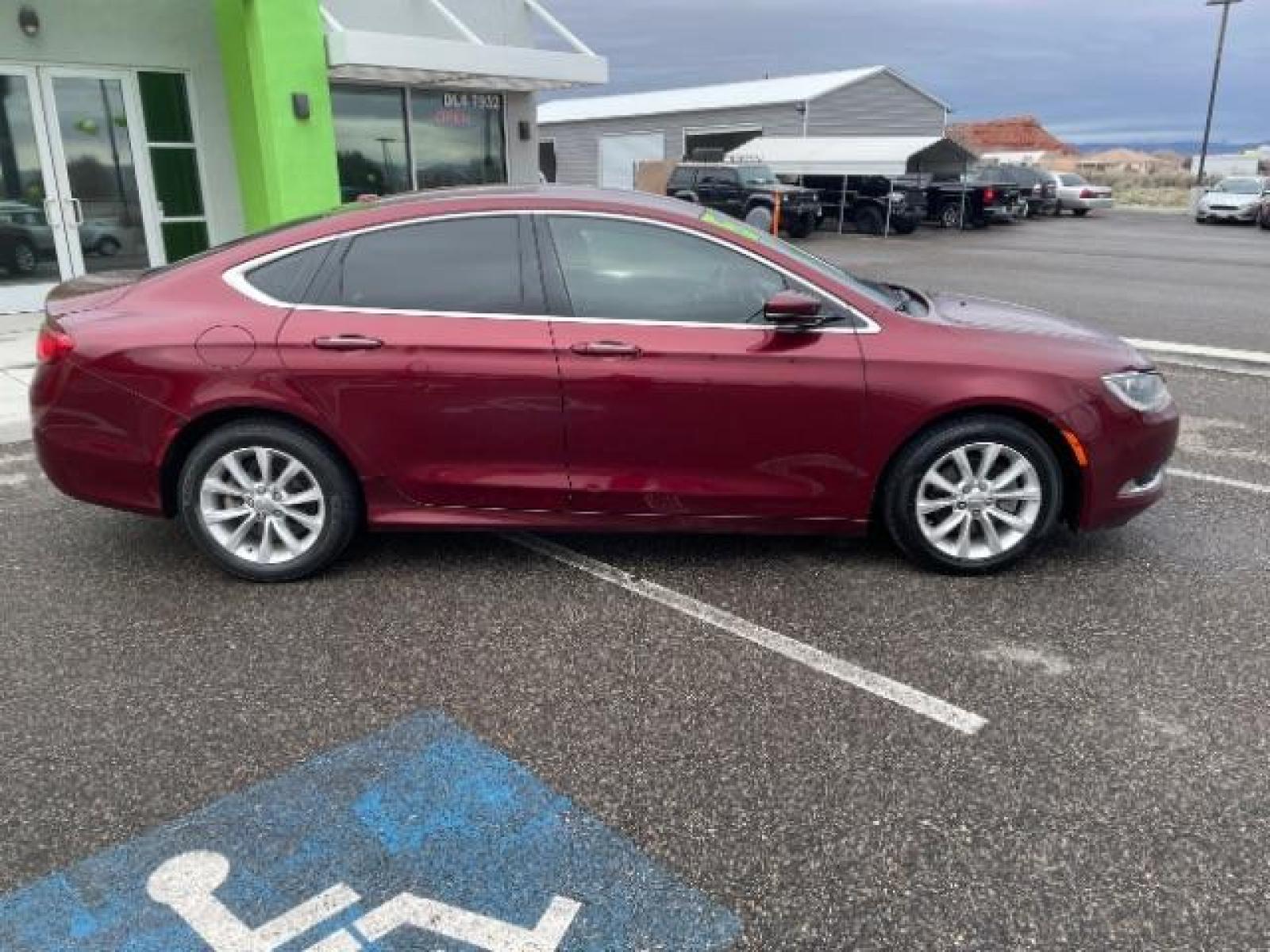 2015 Velvet Red Pearlcoat /Black Chrysler 200 C (1C3CCCCBXFN) with an 2.4L L4 DOHC 16V engine, 9-Speed Automatic transmission, located at 1865 East Red Hills Pkwy, St. George, 84770, (435) 628-0023, 37.120850, -113.543640 - We specialize in helping ALL people get the best financing available. No matter your credit score, good, bad or none we can get you an amazing rate. Had a bankruptcy, divorce, or repossessions? We give you the green light to get your credit back on the road. Low down and affordable payments that fit - Photo #11