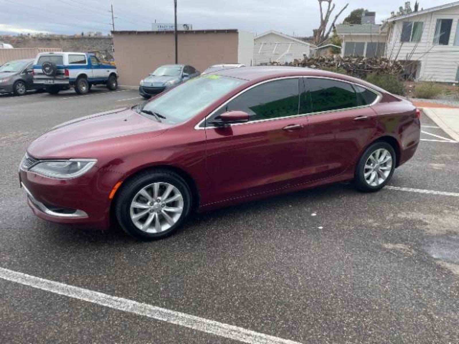2015 Velvet Red Pearlcoat /Black Chrysler 200 C (1C3CCCCBXFN) with an 2.4L L4 DOHC 16V engine, 9-Speed Automatic transmission, located at 1865 East Red Hills Pkwy, St. George, 84770, (435) 628-0023, 37.120850, -113.543640 - We specialize in helping ALL people get the best financing available. No matter your credit score, good, bad or none we can get you an amazing rate. Had a bankruptcy, divorce, or repossessions? We give you the green light to get your credit back on the road. Low down and affordable payments that fit - Photo #4