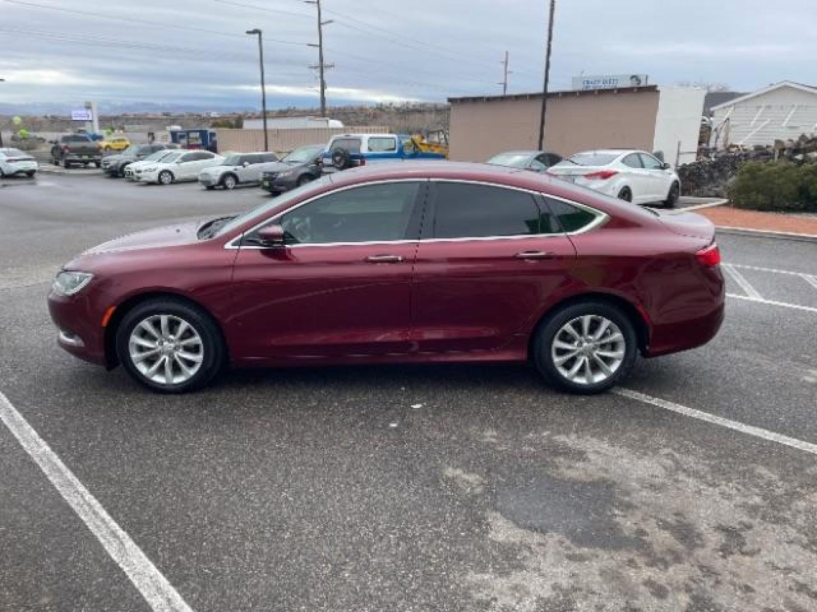 2015 Velvet Red Pearlcoat /Black Chrysler 200 C (1C3CCCCBXFN) with an 2.4L L4 DOHC 16V engine, 9-Speed Automatic transmission, located at 1865 East Red Hills Pkwy, St. George, 84770, (435) 628-0023, 37.120850, -113.543640 - We specialize in helping ALL people get the best financing available. No matter your credit score, good, bad or none we can get you an amazing rate. Had a bankruptcy, divorce, or repossessions? We give you the green light to get your credit back on the road. Low down and affordable payments that fit - Photo #5