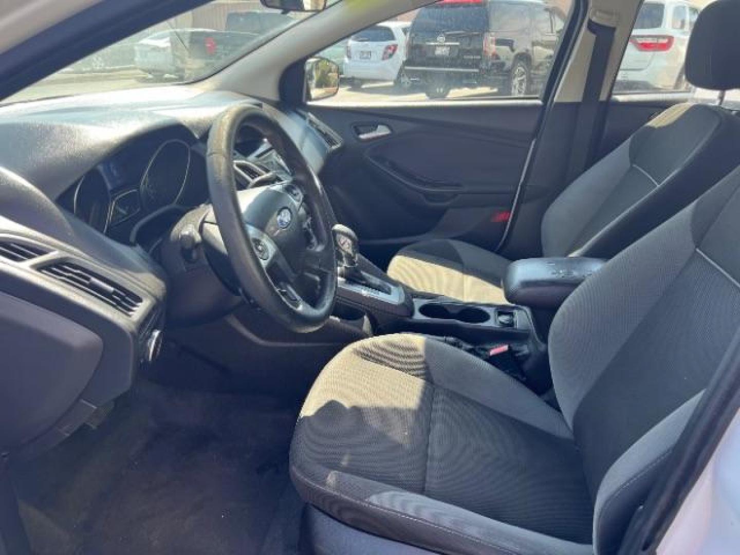 2012 Oxford White /Charcoal Black/Metal Gray Cloth Interior Ford Focus SE (1FAHP3K27CL) with an 2.0L L4 DOHC 16V engine, 6-Speed Automatic transmission, located at 1865 East Red Hills Pkwy, St. George, 84770, (435) 628-0023, 37.120850, -113.543640 - We specialize in helping ALL people get the best financing available. No matter your credit score, good, bad or none we can get you an amazing rate. Had a bankruptcy, divorce, or repossessions? We give you the green light to get your credit back on the road. Low down and affordable payments that fit - Photo#13