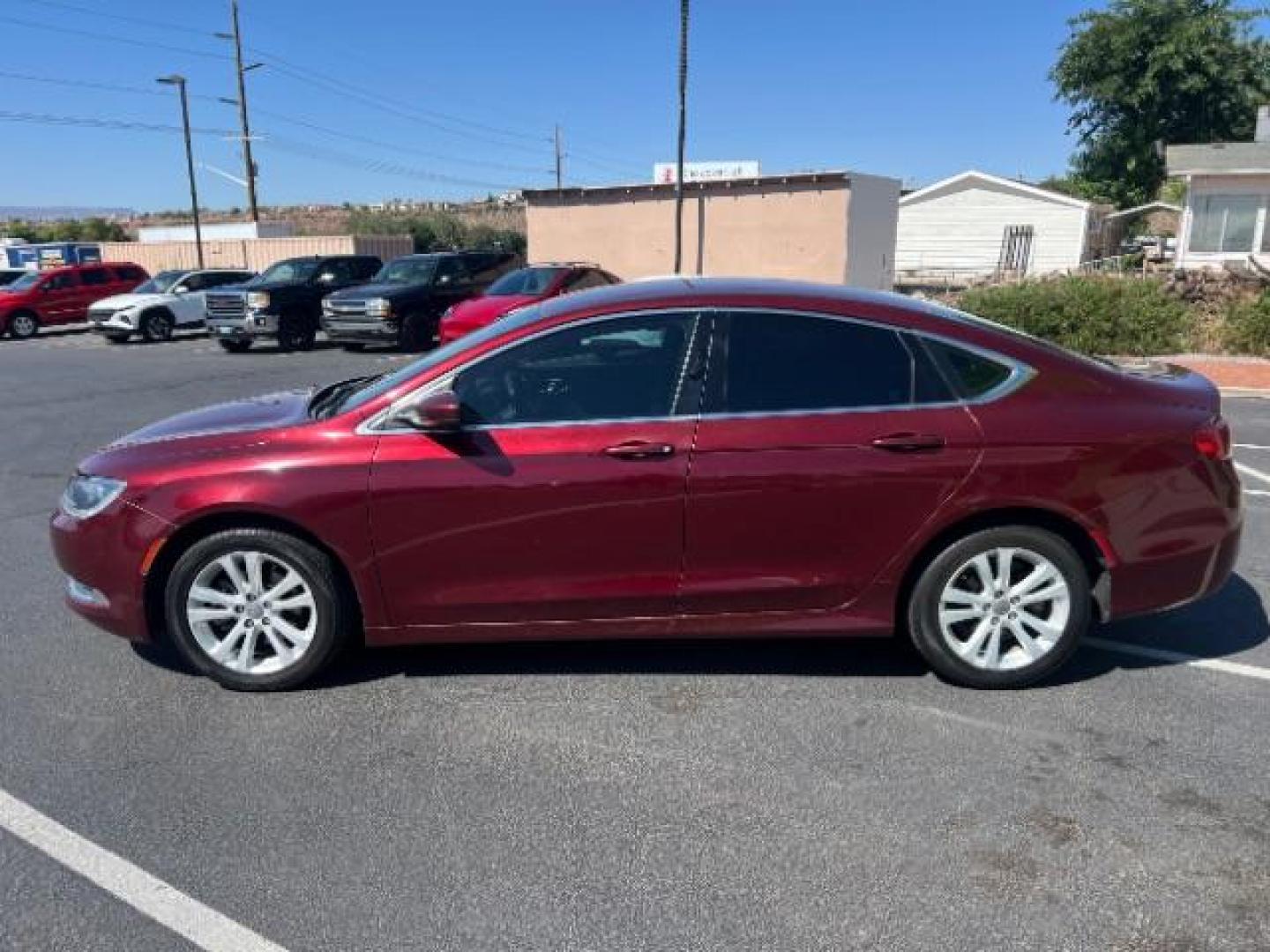 2016 Velvet Red Pearl Coat /Black, premium cloth Chrysler 200 Limited (1C3CCCAB9GN) with an 2.4L L4 DOHC 16V engine, 9-Speed Automatic transmission, located at 1865 East Red Hills Pkwy, St. George, 84770, (435) 628-0023, 37.120850, -113.543640 - We specialize in helping ALL people get the best financing available. No matter your credit score, good, bad or none we can get you an amazing rate. Had a bankruptcy, divorce, or repossessions? We give you the green light to get your credit back on the road. Low down and affordable payments that fit- Photo#3