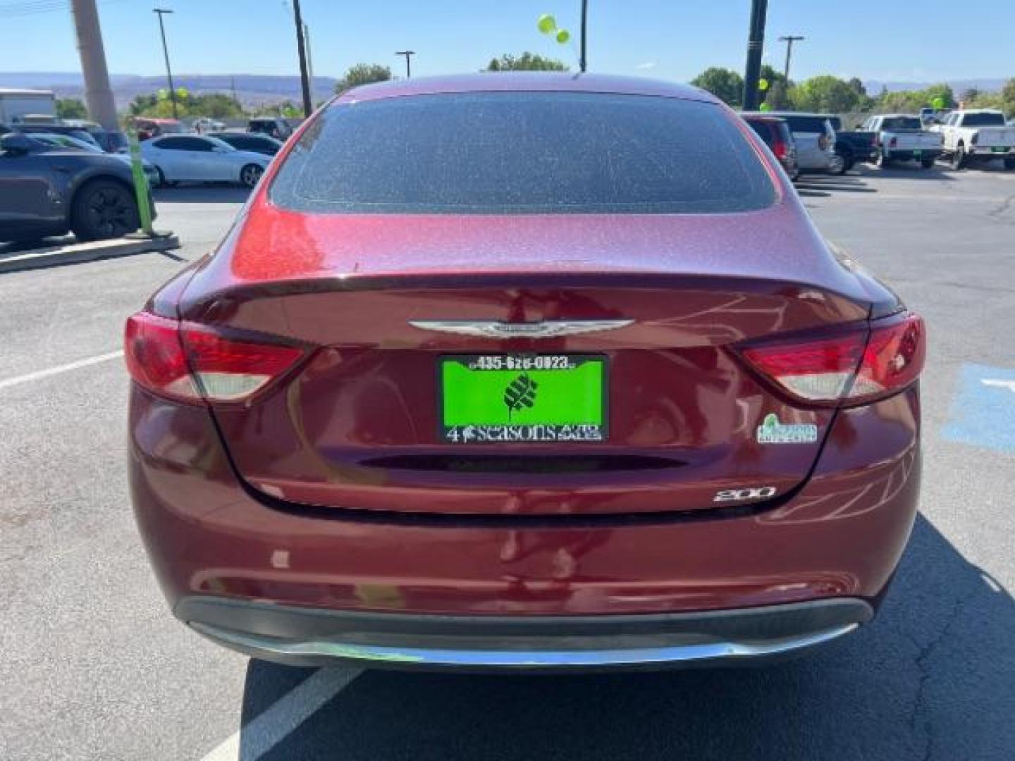 2016 Velvet Red Pearl Coat /Black, premium cloth Chrysler 200 Limited (1C3CCCAB9GN) with an 2.4L L4 DOHC 16V engine, 9-Speed Automatic transmission, located at 1865 East Red Hills Pkwy, St. George, 84770, (435) 628-0023, 37.120850, -113.543640 - We specialize in helping ALL people get the best financing available. No matter your credit score, good, bad or none we can get you an amazing rate. Had a bankruptcy, divorce, or repossessions? We give you the green light to get your credit back on the road. Low down and affordable payments that fit- Photo#5