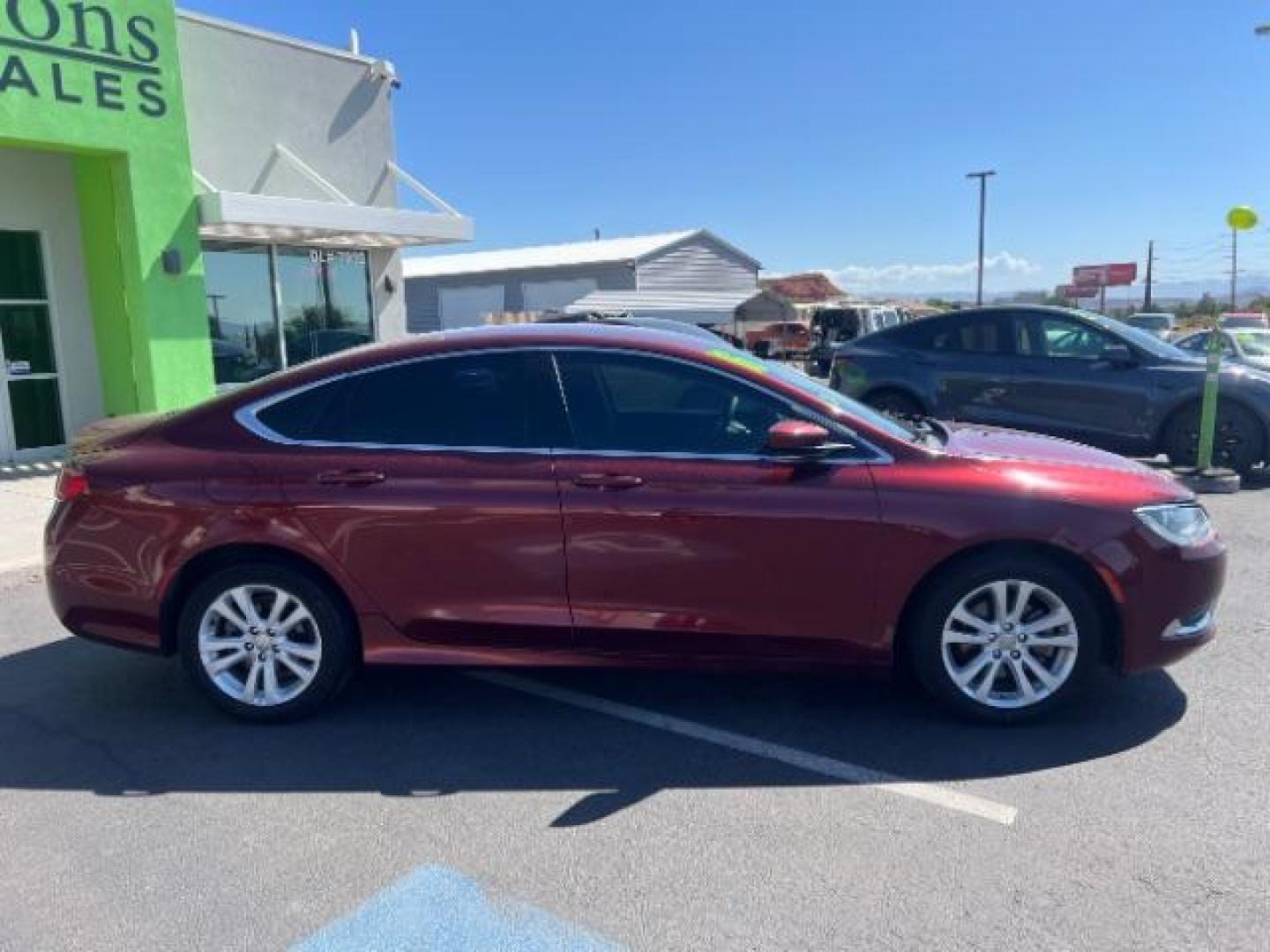 2016 Velvet Red Pearl Coat /Black, premium cloth Chrysler 200 Limited (1C3CCCAB9GN) with an 2.4L L4 DOHC 16V engine, 9-Speed Automatic transmission, located at 1865 East Red Hills Pkwy, St. George, 84770, (435) 628-0023, 37.120850, -113.543640 - We specialize in helping ALL people get the best financing available. No matter your credit score, good, bad or none we can get you an amazing rate. Had a bankruptcy, divorce, or repossessions? We give you the green light to get your credit back on the road. Low down and affordable payments that fit- Photo#7