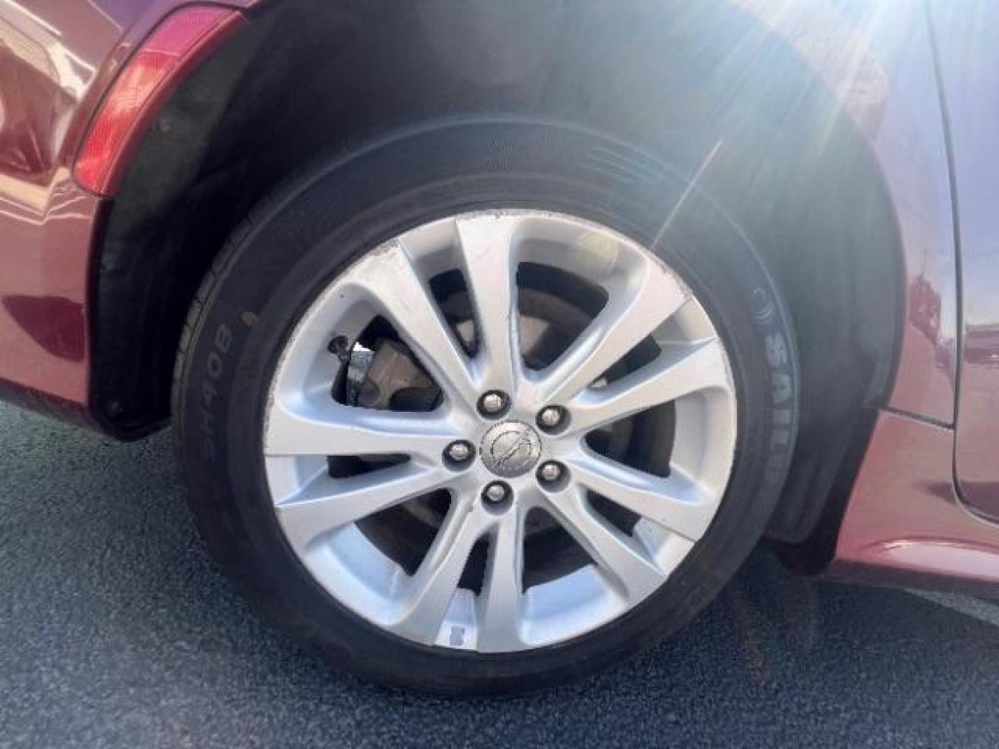 2016 Velvet Red Pearl Coat /Black, premium cloth Chrysler 200 Limited (1C3CCCAB9GN) with an 2.4L L4 DOHC 16V engine, 9-Speed Automatic transmission, located at 1865 East Red Hills Pkwy, St. George, 84770, (435) 628-0023, 37.120850, -113.543640 - We specialize in helping ALL people get the best financing available. No matter your credit score, good, bad or none we can get you an amazing rate. Had a bankruptcy, divorce, or repossessions? We give you the green light to get your credit back on the road. Low down and affordable payments that fit- Photo#9