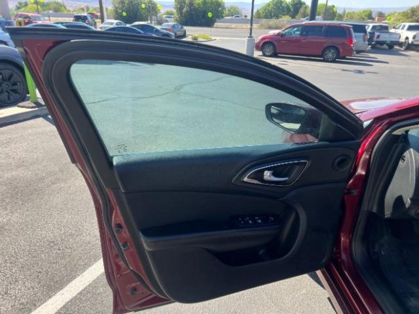 2016 Velvet Red Pearl Coat /Black, premium cloth Chrysler 200 Limited (1C3CCCAB9GN) with an 2.4L L4 DOHC 16V engine, 9-Speed Automatic transmission, located at 1865 East Red Hills Pkwy, St. George, 84770, (435) 628-0023, 37.120850, -113.543640 - We specialize in helping ALL people get the best financing available. No matter your credit score, good, bad or none we can get you an amazing rate. Had a bankruptcy, divorce, or repossessions? We give you the green light to get your credit back on the road. Low down and affordable payments that fit- Photo#12