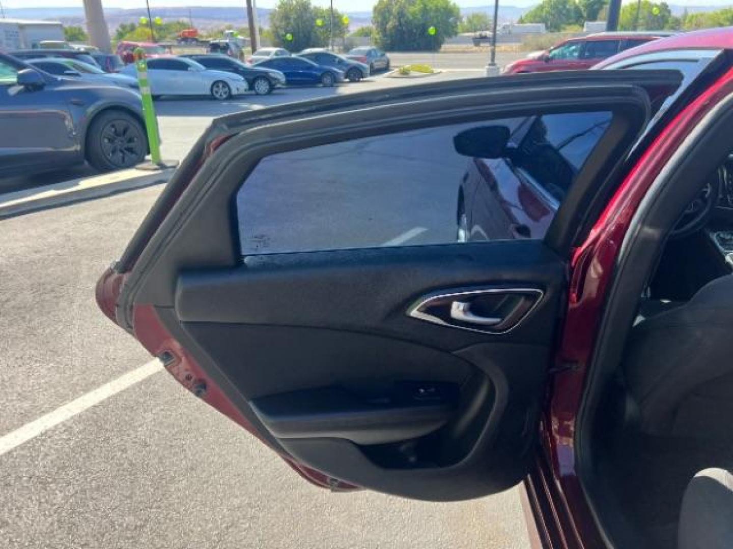 2016 Velvet Red Pearl Coat /Black, premium cloth Chrysler 200 Limited (1C3CCCAB9GN) with an 2.4L L4 DOHC 16V engine, 9-Speed Automatic transmission, located at 1865 East Red Hills Pkwy, St. George, 84770, (435) 628-0023, 37.120850, -113.543640 - We specialize in helping ALL people get the best financing available. No matter your credit score, good, bad or none we can get you an amazing rate. Had a bankruptcy, divorce, or repossessions? We give you the green light to get your credit back on the road. Low down and affordable payments that fit- Photo#20