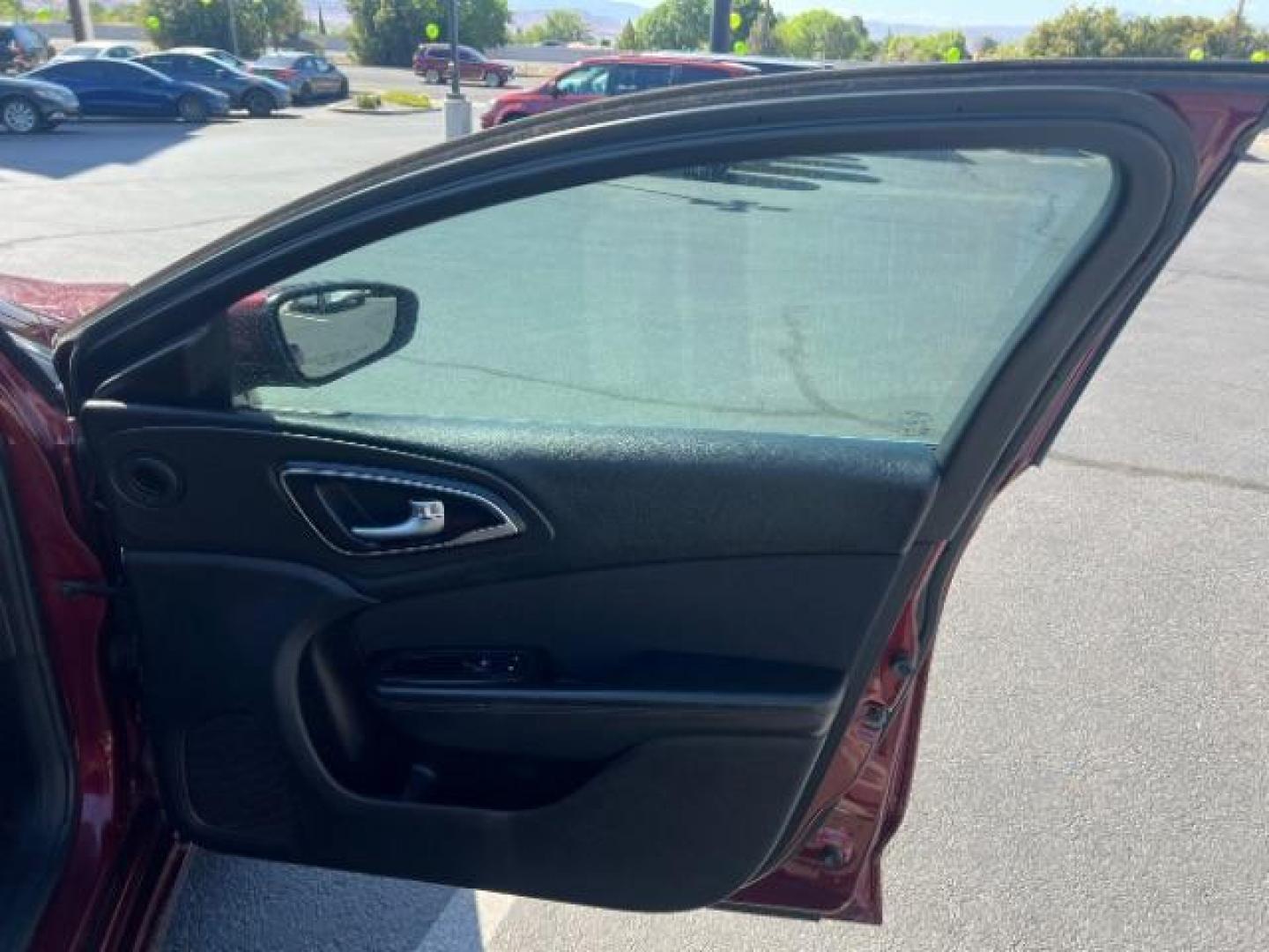 2016 Velvet Red Pearl Coat /Black, premium cloth Chrysler 200 Limited (1C3CCCAB9GN) with an 2.4L L4 DOHC 16V engine, 9-Speed Automatic transmission, located at 1865 East Red Hills Pkwy, St. George, 84770, (435) 628-0023, 37.120850, -113.543640 - We specialize in helping ALL people get the best financing available. No matter your credit score, good, bad or none we can get you an amazing rate. Had a bankruptcy, divorce, or repossessions? We give you the green light to get your credit back on the road. Low down and affordable payments that fit- Photo#27