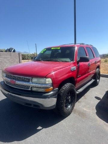 2002 Victory Red /Tan/Neutral Custom Cloth Interior Chevrolet Tahoe 2WD (1GNEC13VX2R) with an 4.8L V8 OHV 16V engine, 4-Speed Automatic transmission, located at 1865 East Red Hills Pkwy, St. George, 84770, (435) 628-0023, 37.120850, -113.543640 - This vehicle is a Mechanic Special. This means it will need some love. Runs a drives fine but has body damage, leaks or other mechanical issues. It did NOT pass our 50 point inspection. Get a great deal on a less than perfect car. These cars do NOT qualify for our in house financing. Cash and carry,- Photo#1