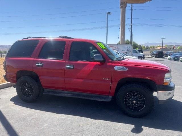2002 Victory Red /Tan/Neutral Custom Cloth Interior Chevrolet Tahoe 2WD (1GNEC13VX2R) with an 4.8L V8 OHV 16V engine, 4-Speed Automatic transmission, located at 1865 East Red Hills Pkwy, St. George, 84770, (435) 628-0023, 37.120850, -113.543640 - This vehicle is a Mechanic Special. This means it will need some love. Runs a drives fine but has body damage, leaks or other mechanical issues. It did NOT pass our 50 point inspection. Get a great deal on a less than perfect car. These cars do NOT qualify for our in house financing. Cash and carry,- Photo#3