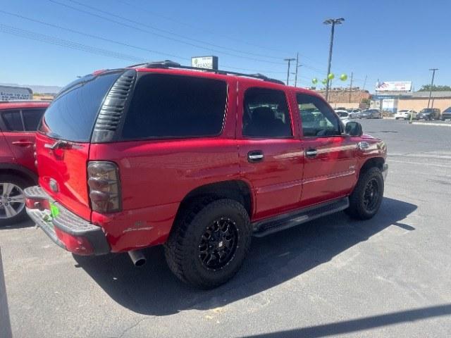 2002 Victory Red /Tan/Neutral Custom Cloth Interior Chevrolet Tahoe 2WD (1GNEC13VX2R) with an 4.8L V8 OHV 16V engine, 4-Speed Automatic transmission, located at 1865 East Red Hills Pkwy, St. George, 84770, (435) 628-0023, 37.120850, -113.543640 - This vehicle is a Mechanic Special. This means it will need some love. Runs a drives fine but has body damage, leaks or other mechanical issues. It did NOT pass our 50 point inspection. Get a great deal on a less than perfect car. These cars do NOT qualify for our in house financing. Cash and carry,- Photo#4