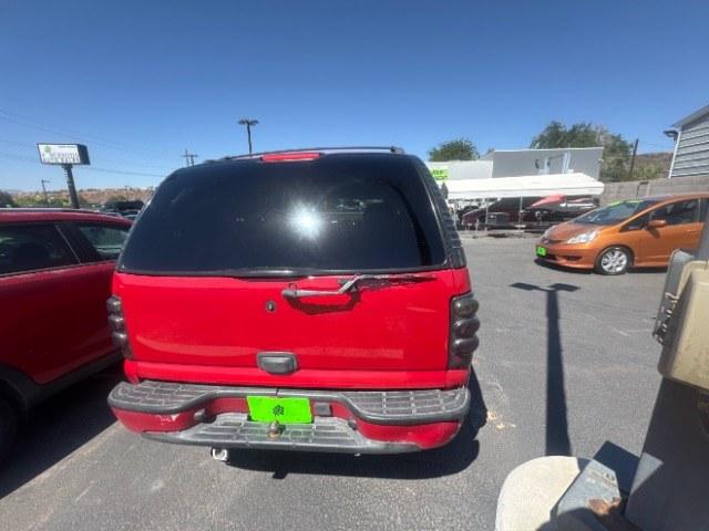 2002 Victory Red /Tan/Neutral Custom Cloth Interior Chevrolet Tahoe 2WD (1GNEC13VX2R) with an 4.8L V8 OHV 16V engine, 4-Speed Automatic transmission, located at 1865 East Red Hills Pkwy, St. George, 84770, (435) 628-0023, 37.120850, -113.543640 - This vehicle is a Mechanic Special. This means it will need some love. Runs a drives fine but has body damage, leaks or other mechanical issues. It did NOT pass our 50 point inspection. Get a great deal on a less than perfect car. These cars do NOT qualify for our in house financing. Cash and carry,- Photo#5