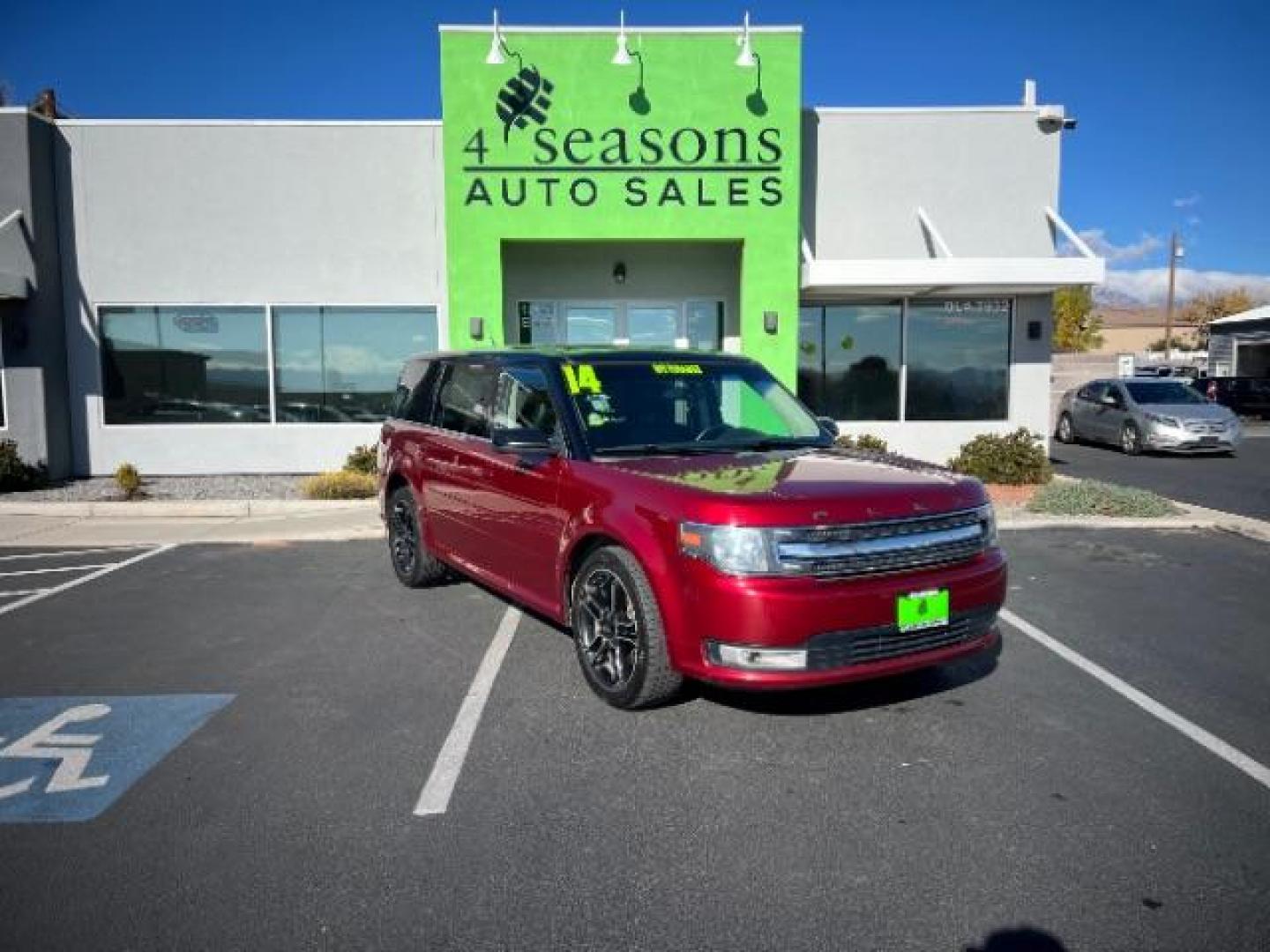 2014 Ruby Red Met Tinted CC /Charcoal Black Ford Flex SEL FWD (2FMGK5C84EB) with an 3.5L V6 DOHC 24V engine, 6-Speed Automatic Overdrive transmission, located at 940 North Main Street, Cedar City, UT, 84720, (435) 628-0023, 37.692936, -113.061897 - We specialize in helping ALL people get the best financing available. No matter your credit score, good, bad or none we can get you an amazing rate. Had a bankruptcy, divorce, or repossessions? We give you the green light to get your credit back on the road. Low down and affordable payments that fit - Photo#0