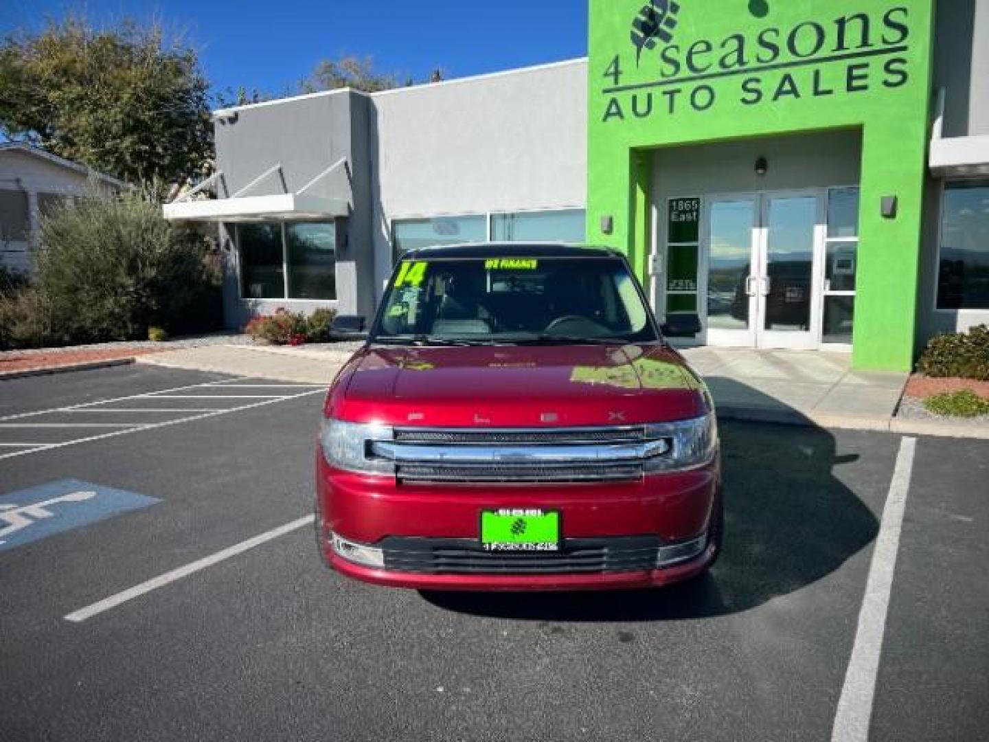 2014 Ruby Red Met Tinted CC /Charcoal Black Ford Flex SEL FWD (2FMGK5C84EB) with an 3.5L V6 DOHC 24V engine, 6-Speed Automatic Overdrive transmission, located at 940 North Main Street, Cedar City, UT, 84720, (435) 628-0023, 37.692936, -113.061897 - We specialize in helping ALL people get the best financing available. No matter your credit score, good, bad or none we can get you an amazing rate. Had a bankruptcy, divorce, or repossessions? We give you the green light to get your credit back on the road. Low down and affordable payments that fit - Photo#1