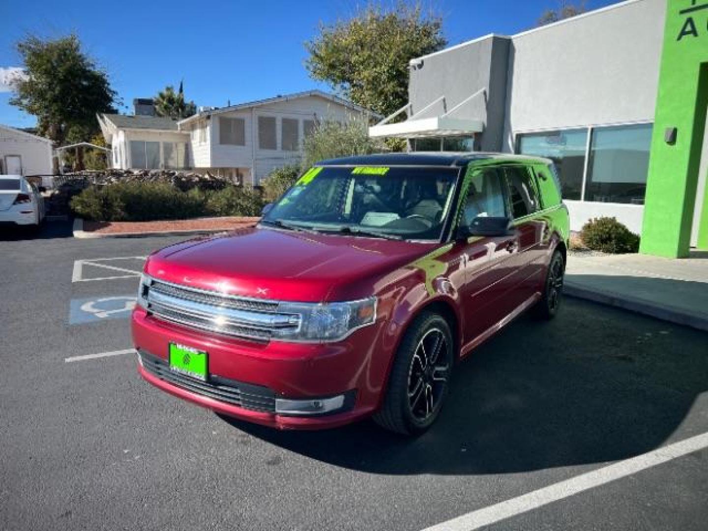 2014 Ruby Red Met Tinted CC /Charcoal Black Ford Flex SEL FWD (2FMGK5C84EB) with an 3.5L V6 DOHC 24V engine, 6-Speed Automatic Overdrive transmission, located at 940 North Main Street, Cedar City, UT, 84720, (435) 628-0023, 37.692936, -113.061897 - We specialize in helping ALL people get the best financing available. No matter your credit score, good, bad or none we can get you an amazing rate. Had a bankruptcy, divorce, or repossessions? We give you the green light to get your credit back on the road. Low down and affordable payments that fit - Photo#2