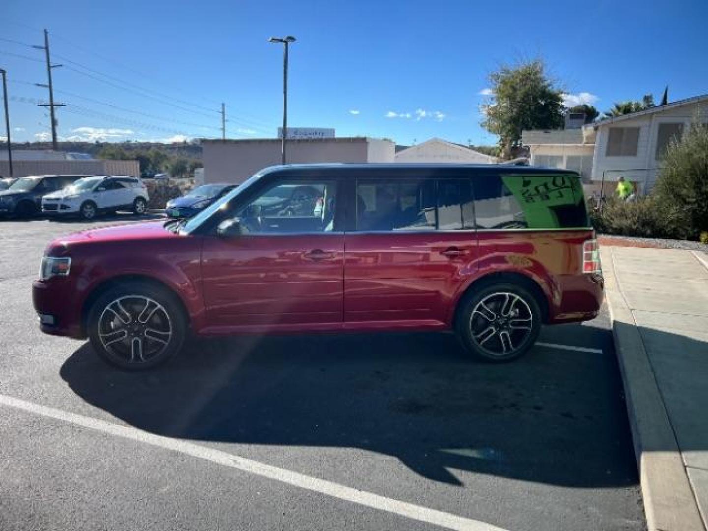 2014 Ruby Red Met Tinted CC /Charcoal Black Ford Flex SEL FWD (2FMGK5C84EB) with an 3.5L V6 DOHC 24V engine, 6-Speed Automatic Overdrive transmission, located at 940 North Main Street, Cedar City, UT, 84720, (435) 628-0023, 37.692936, -113.061897 - We specialize in helping ALL people get the best financing available. No matter your credit score, good, bad or none we can get you an amazing rate. Had a bankruptcy, divorce, or repossessions? We give you the green light to get your credit back on the road. Low down and affordable payments that fit - Photo#3