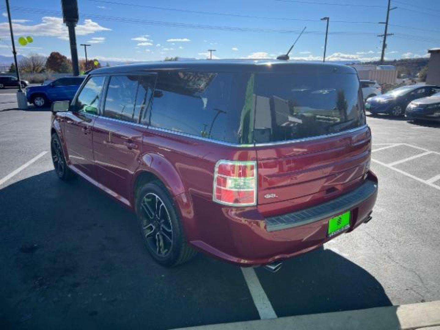 2014 Ruby Red Met Tinted CC /Charcoal Black Ford Flex SEL FWD (2FMGK5C84EB) with an 3.5L V6 DOHC 24V engine, 6-Speed Automatic Overdrive transmission, located at 940 North Main Street, Cedar City, UT, 84720, (435) 628-0023, 37.692936, -113.061897 - We specialize in helping ALL people get the best financing available. No matter your credit score, good, bad or none we can get you an amazing rate. Had a bankruptcy, divorce, or repossessions? We give you the green light to get your credit back on the road. Low down and affordable payments that fit - Photo#4