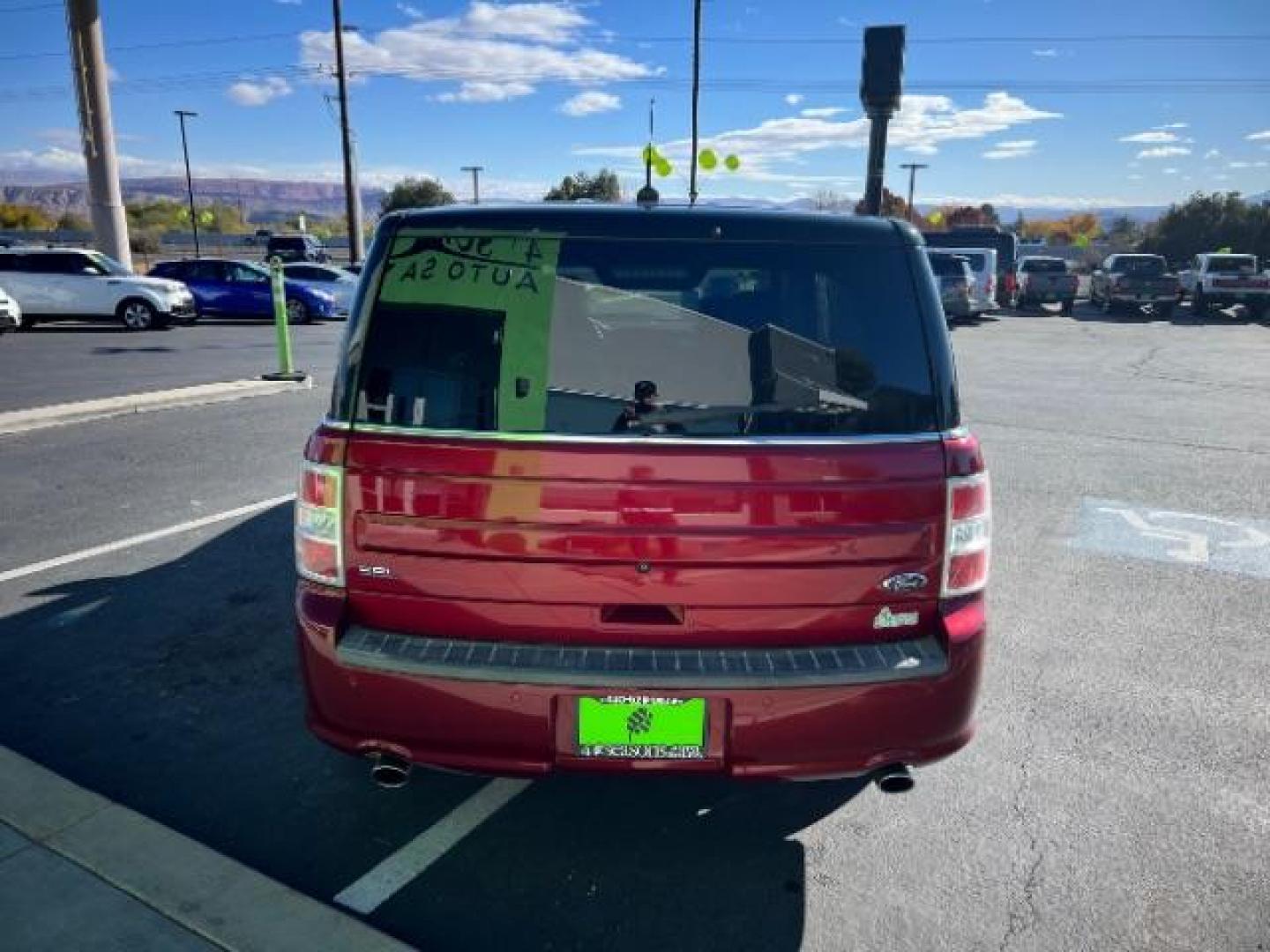 2014 Ruby Red Met Tinted CC /Charcoal Black Ford Flex SEL FWD (2FMGK5C84EB) with an 3.5L V6 DOHC 24V engine, 6-Speed Automatic Overdrive transmission, located at 940 North Main Street, Cedar City, UT, 84720, (435) 628-0023, 37.692936, -113.061897 - We specialize in helping ALL people get the best financing available. No matter your credit score, good, bad or none we can get you an amazing rate. Had a bankruptcy, divorce, or repossessions? We give you the green light to get your credit back on the road. Low down and affordable payments that fit - Photo#5