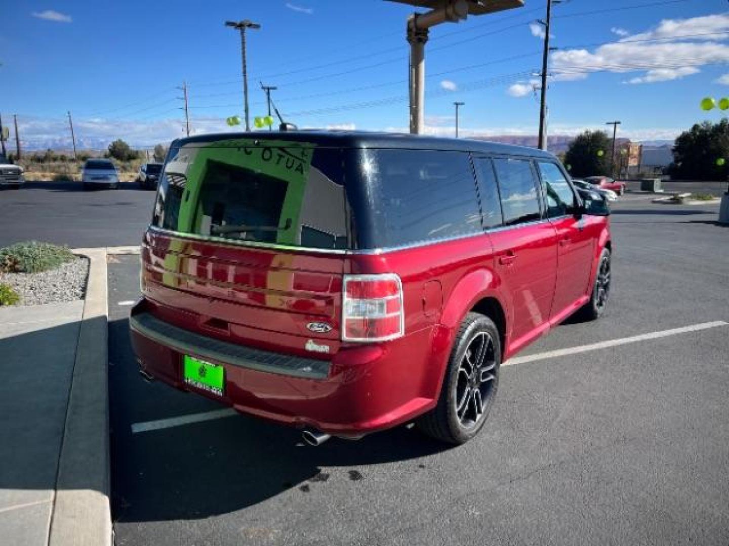 2014 Ruby Red Met Tinted CC /Charcoal Black Ford Flex SEL FWD (2FMGK5C84EB) with an 3.5L V6 DOHC 24V engine, 6-Speed Automatic Overdrive transmission, located at 940 North Main Street, Cedar City, UT, 84720, (435) 628-0023, 37.692936, -113.061897 - We specialize in helping ALL people get the best financing available. No matter your credit score, good, bad or none we can get you an amazing rate. Had a bankruptcy, divorce, or repossessions? We give you the green light to get your credit back on the road. Low down and affordable payments that fit - Photo#6