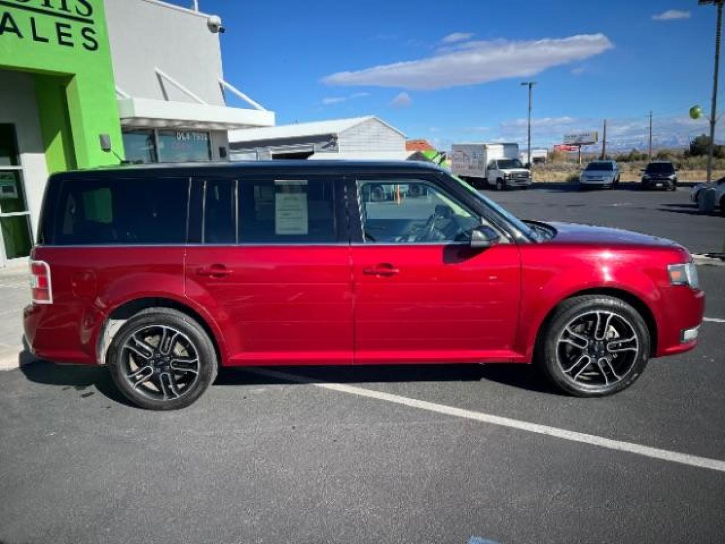 2014 Ruby Red Met Tinted CC /Charcoal Black Ford Flex SEL FWD (2FMGK5C84EB) with an 3.5L V6 DOHC 24V engine, 6-Speed Automatic Overdrive transmission, located at 940 North Main Street, Cedar City, UT, 84720, (435) 628-0023, 37.692936, -113.061897 - We specialize in helping ALL people get the best financing available. No matter your credit score, good, bad or none we can get you an amazing rate. Had a bankruptcy, divorce, or repossessions? We give you the green light to get your credit back on the road. Low down and affordable payments that fit - Photo#7