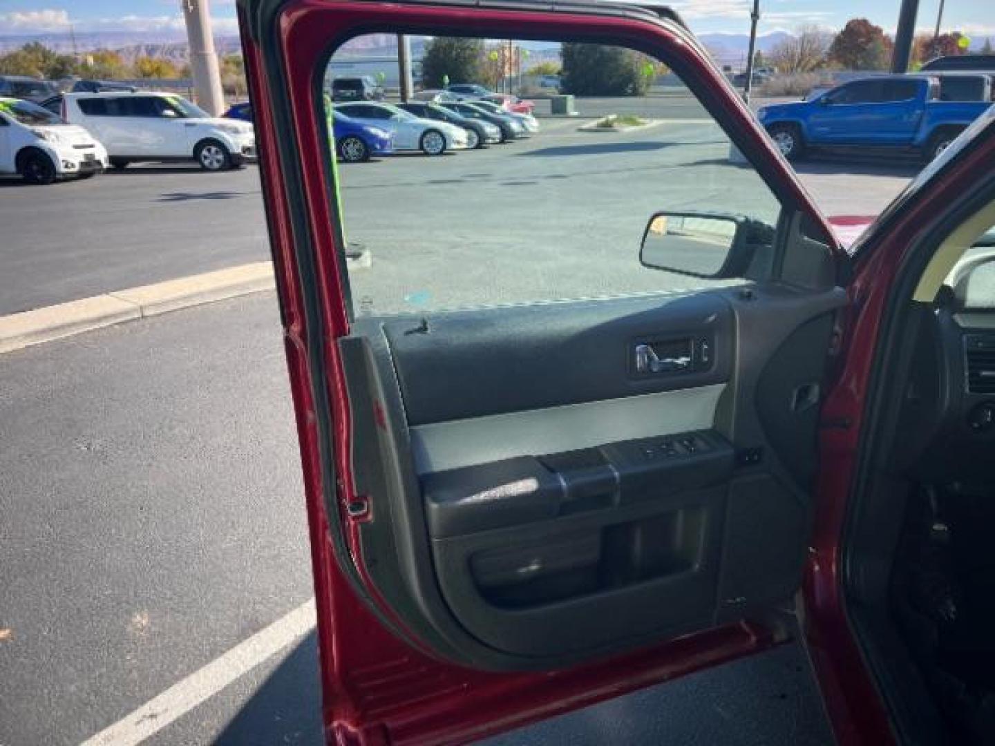 2014 Ruby Red Met Tinted CC /Charcoal Black Ford Flex SEL FWD (2FMGK5C84EB) with an 3.5L V6 DOHC 24V engine, 6-Speed Automatic Overdrive transmission, located at 940 North Main Street, Cedar City, UT, 84720, (435) 628-0023, 37.692936, -113.061897 - We specialize in helping ALL people get the best financing available. No matter your credit score, good, bad or none we can get you an amazing rate. Had a bankruptcy, divorce, or repossessions? We give you the green light to get your credit back on the road. Low down and affordable payments that fit - Photo#12