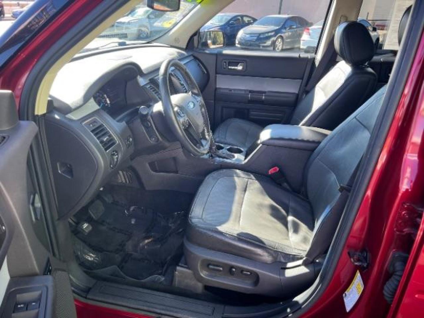 2014 Ruby Red Met Tinted CC /Charcoal Black Ford Flex SEL FWD (2FMGK5C84EB) with an 3.5L V6 DOHC 24V engine, 6-Speed Automatic Overdrive transmission, located at 940 North Main Street, Cedar City, UT, 84720, (435) 628-0023, 37.692936, -113.061897 - We specialize in helping ALL people get the best financing available. No matter your credit score, good, bad or none we can get you an amazing rate. Had a bankruptcy, divorce, or repossessions? We give you the green light to get your credit back on the road. Low down and affordable payments that fit - Photo#14