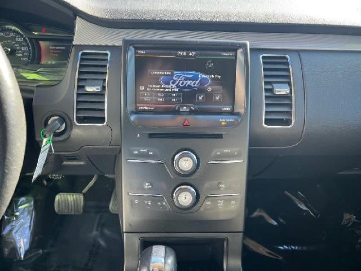 2014 Ruby Red Met Tinted CC /Charcoal Black Ford Flex SEL FWD (2FMGK5C84EB) with an 3.5L V6 DOHC 24V engine, 6-Speed Automatic Overdrive transmission, located at 940 North Main Street, Cedar City, UT, 84720, (435) 628-0023, 37.692936, -113.061897 - We specialize in helping ALL people get the best financing available. No matter your credit score, good, bad or none we can get you an amazing rate. Had a bankruptcy, divorce, or repossessions? We give you the green light to get your credit back on the road. Low down and affordable payments that fit - Photo#17