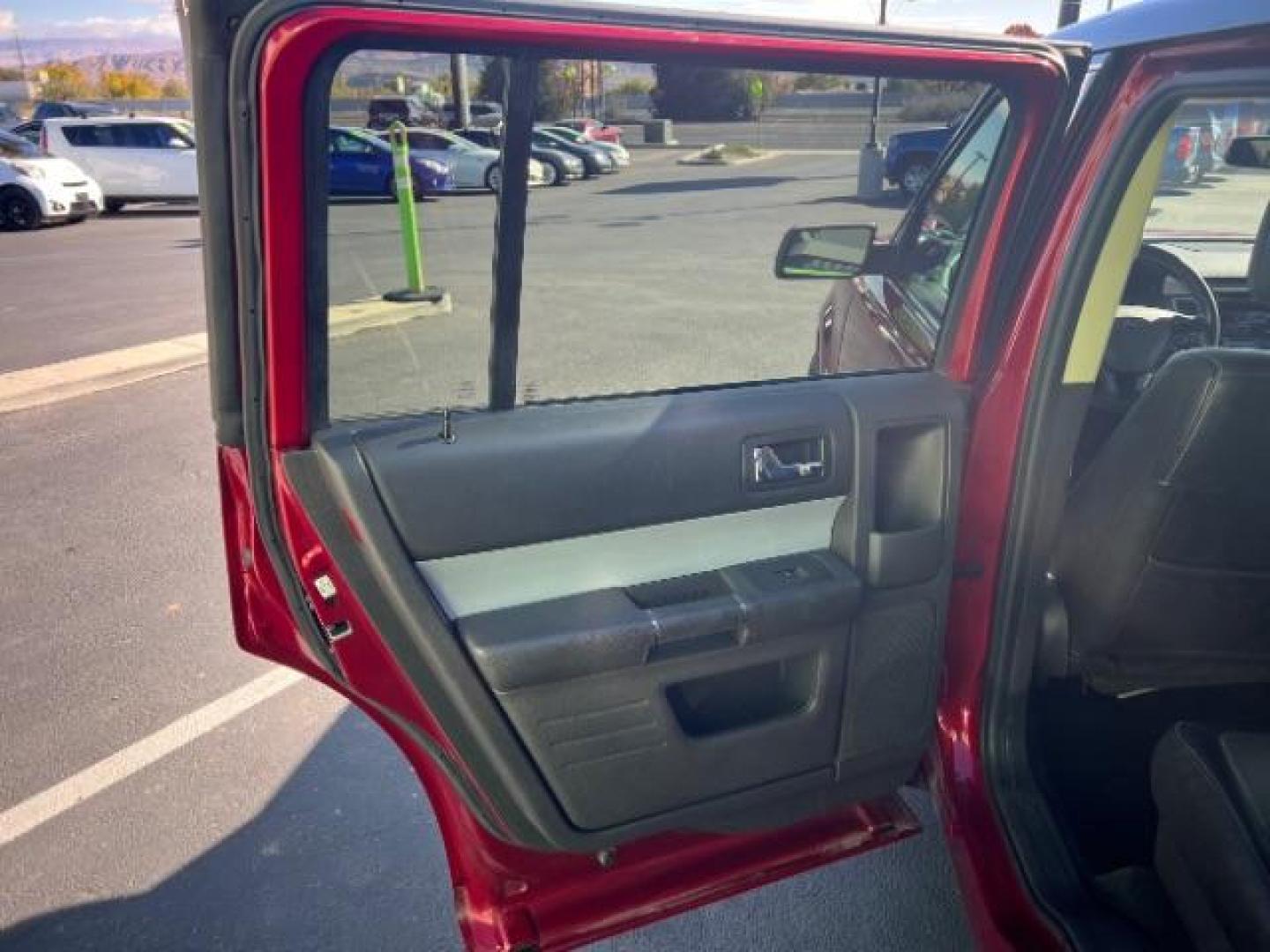 2014 Ruby Red Met Tinted CC /Charcoal Black Ford Flex SEL FWD (2FMGK5C84EB) with an 3.5L V6 DOHC 24V engine, 6-Speed Automatic Overdrive transmission, located at 940 North Main Street, Cedar City, UT, 84720, (435) 628-0023, 37.692936, -113.061897 - We specialize in helping ALL people get the best financing available. No matter your credit score, good, bad or none we can get you an amazing rate. Had a bankruptcy, divorce, or repossessions? We give you the green light to get your credit back on the road. Low down and affordable payments that fit - Photo#20