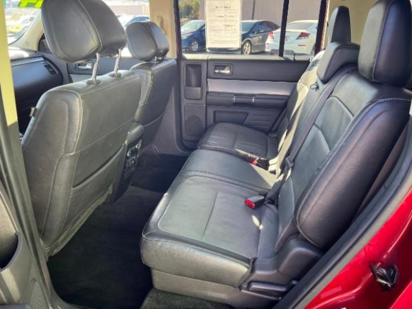 2014 Ruby Red Met Tinted CC /Charcoal Black Ford Flex SEL FWD (2FMGK5C84EB) with an 3.5L V6 DOHC 24V engine, 6-Speed Automatic Overdrive transmission, located at 940 North Main Street, Cedar City, UT, 84720, (435) 628-0023, 37.692936, -113.061897 - We specialize in helping ALL people get the best financing available. No matter your credit score, good, bad or none we can get you an amazing rate. Had a bankruptcy, divorce, or repossessions? We give you the green light to get your credit back on the road. Low down and affordable payments that fit - Photo#21