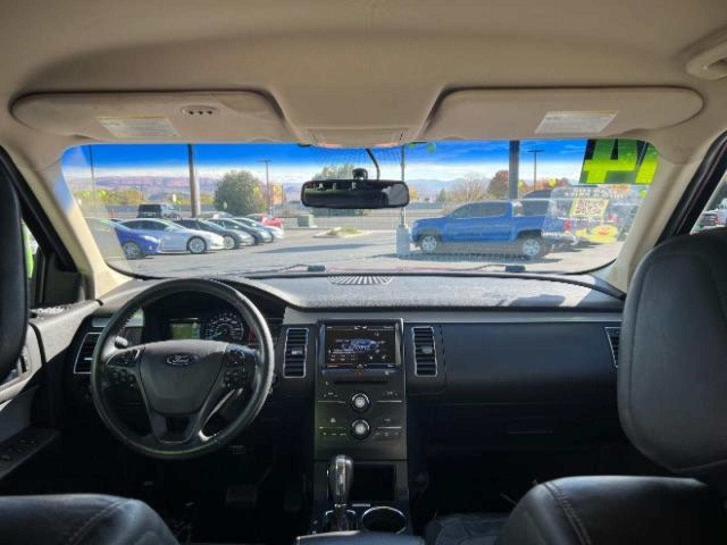 2014 Ruby Red Met Tinted CC /Charcoal Black Ford Flex SEL FWD (2FMGK5C84EB) with an 3.5L V6 DOHC 24V engine, 6-Speed Automatic Overdrive transmission, located at 940 North Main Street, Cedar City, UT, 84720, (435) 628-0023, 37.692936, -113.061897 - We specialize in helping ALL people get the best financing available. No matter your credit score, good, bad or none we can get you an amazing rate. Had a bankruptcy, divorce, or repossessions? We give you the green light to get your credit back on the road. Low down and affordable payments that fit - Photo#24
