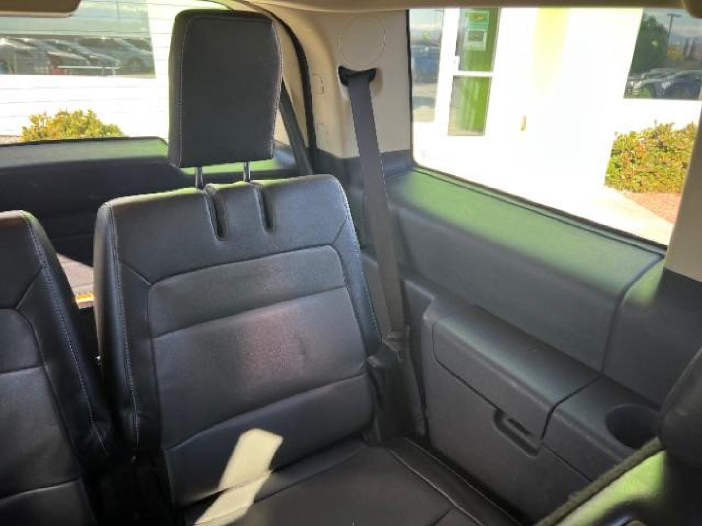 2014 Ruby Red Met Tinted CC /Charcoal Black Ford Flex SEL FWD (2FMGK5C84EB) with an 3.5L V6 DOHC 24V engine, 6-Speed Automatic Overdrive transmission, located at 940 North Main Street, Cedar City, UT, 84720, (435) 628-0023, 37.692936, -113.061897 - We specialize in helping ALL people get the best financing available. No matter your credit score, good, bad or none we can get you an amazing rate. Had a bankruptcy, divorce, or repossessions? We give you the green light to get your credit back on the road. Low down and affordable payments that fit - Photo#25