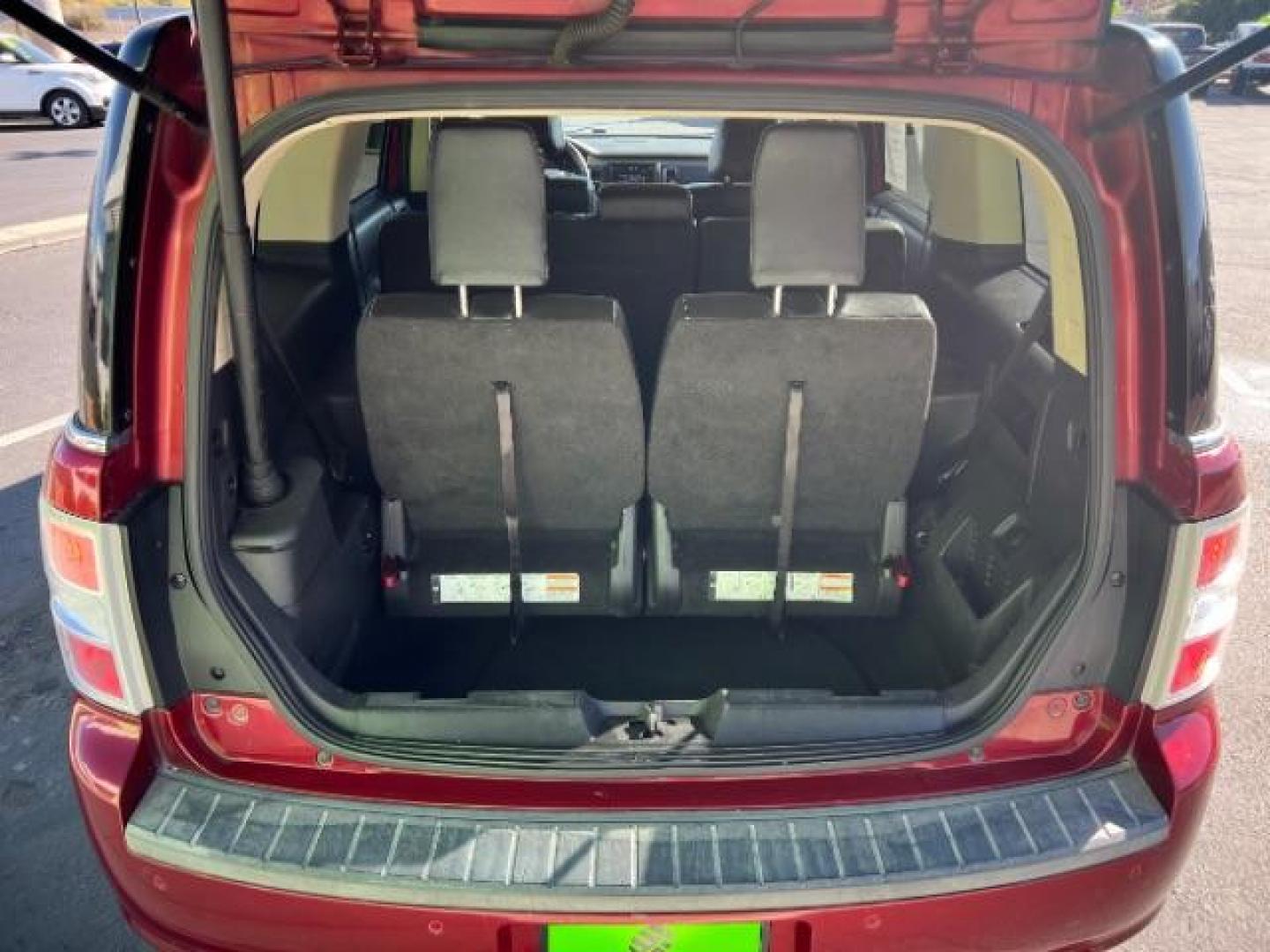 2014 Ruby Red Met Tinted CC /Charcoal Black Ford Flex SEL FWD (2FMGK5C84EB) with an 3.5L V6 DOHC 24V engine, 6-Speed Automatic Overdrive transmission, located at 940 North Main Street, Cedar City, UT, 84720, (435) 628-0023, 37.692936, -113.061897 - We specialize in helping ALL people get the best financing available. No matter your credit score, good, bad or none we can get you an amazing rate. Had a bankruptcy, divorce, or repossessions? We give you the green light to get your credit back on the road. Low down and affordable payments that fit - Photo#28