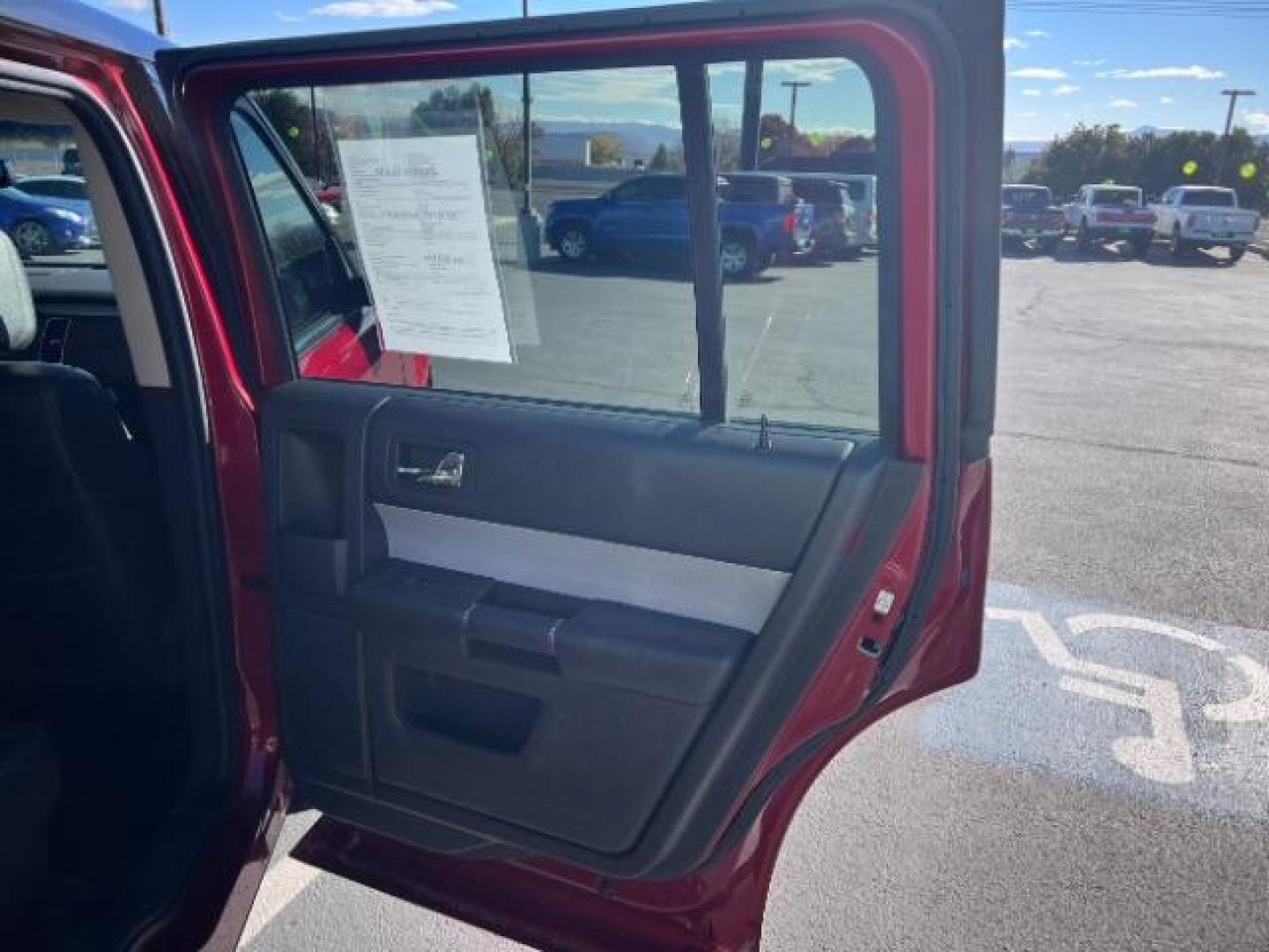 2014 Ruby Red Met Tinted CC /Charcoal Black Ford Flex SEL FWD (2FMGK5C84EB) with an 3.5L V6 DOHC 24V engine, 6-Speed Automatic Overdrive transmission, located at 940 North Main Street, Cedar City, UT, 84720, (435) 628-0023, 37.692936, -113.061897 - We specialize in helping ALL people get the best financing available. No matter your credit score, good, bad or none we can get you an amazing rate. Had a bankruptcy, divorce, or repossessions? We give you the green light to get your credit back on the road. Low down and affordable payments that fit - Photo#29