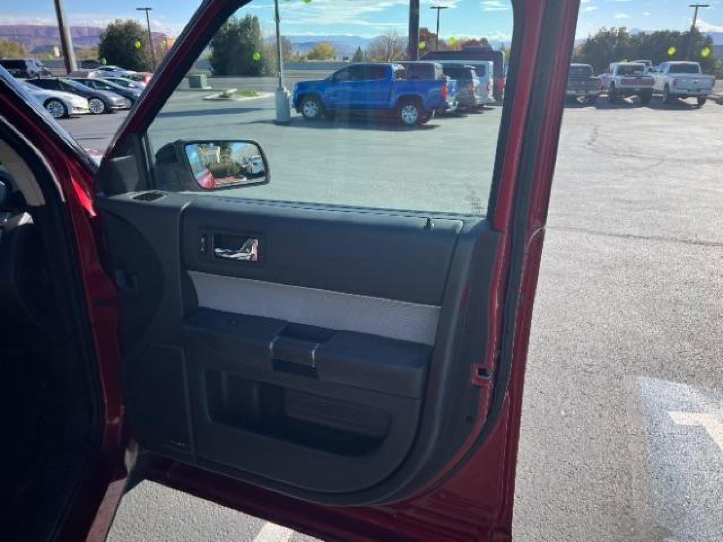 2014 Ruby Red Met Tinted CC /Charcoal Black Ford Flex SEL FWD (2FMGK5C84EB) with an 3.5L V6 DOHC 24V engine, 6-Speed Automatic Overdrive transmission, located at 940 North Main Street, Cedar City, UT, 84720, (435) 628-0023, 37.692936, -113.061897 - We specialize in helping ALL people get the best financing available. No matter your credit score, good, bad or none we can get you an amazing rate. Had a bankruptcy, divorce, or repossessions? We give you the green light to get your credit back on the road. Low down and affordable payments that fit - Photo#31
