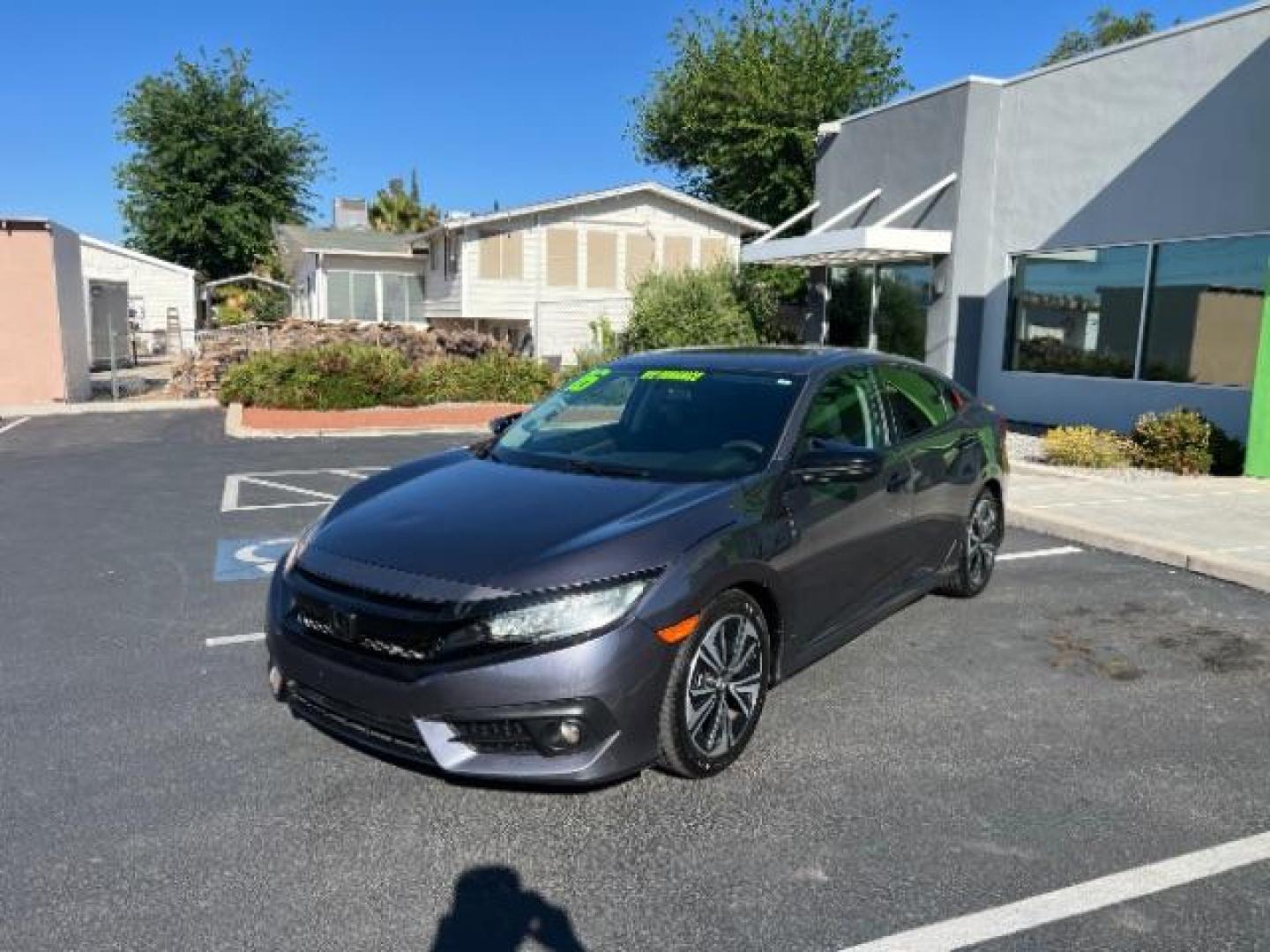 2016 Modern Steel Metallic /Black, cloth Honda Civic EX-T Sedan CVT (19XFC1F38GE) with an 1.5L L4 DOHC 16V TURBO engine, Continuously Variable Transmission transmission, located at 1865 East Red Hills Pkwy, St. George, 84770, (435) 628-0023, 37.120850, -113.543640 - We specialize in helping ALL people get the best financing available. No matter your credit score, good, bad or none we can get you an amazing rate. Had a bankruptcy, divorce, or repossessions? We give you the green light to get your credit back on the road. Low down and affordable payments that fit - Photo#2