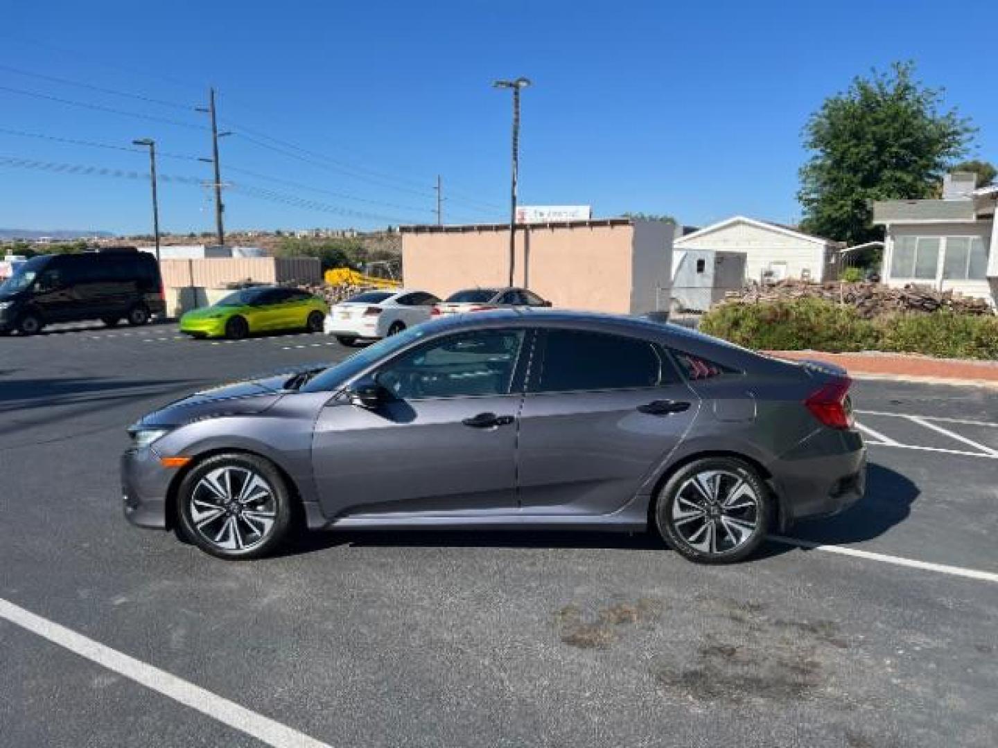 2016 Modern Steel Metallic /Black, cloth Honda Civic EX-T Sedan CVT (19XFC1F38GE) with an 1.5L L4 DOHC 16V TURBO engine, Continuously Variable Transmission transmission, located at 1865 East Red Hills Pkwy, St. George, 84770, (435) 628-0023, 37.120850, -113.543640 - We specialize in helping ALL people get the best financing available. No matter your credit score, good, bad or none we can get you an amazing rate. Had a bankruptcy, divorce, or repossessions? We give you the green light to get your credit back on the road. Low down and affordable payments that fit - Photo#3