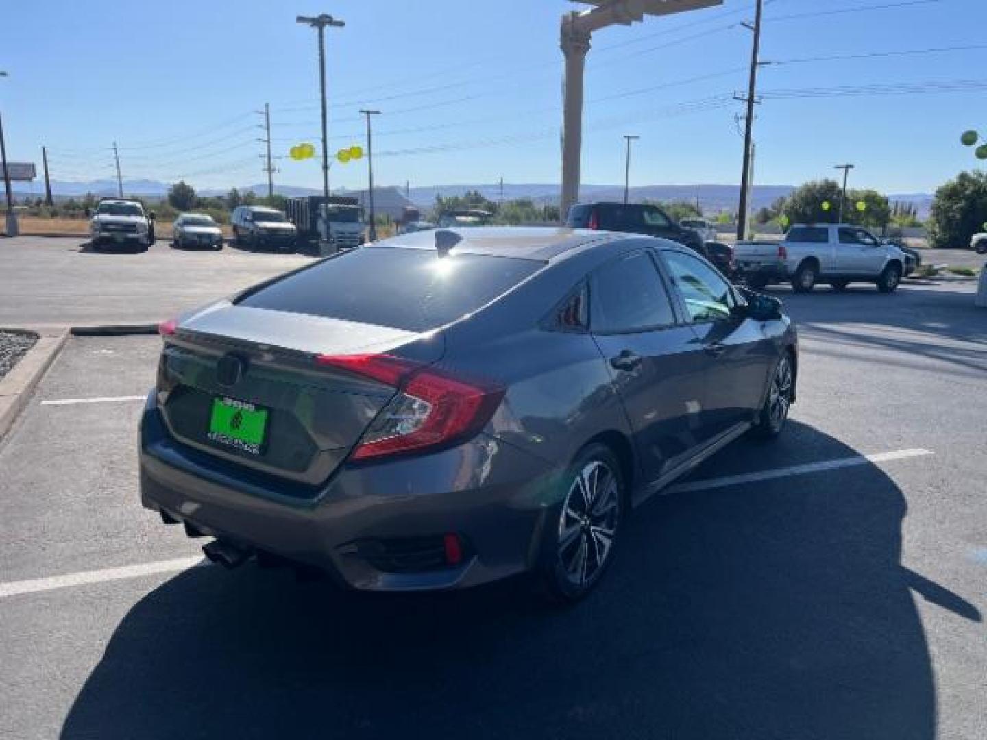 2016 Modern Steel Metallic /Black, cloth Honda Civic EX-T Sedan CVT (19XFC1F38GE) with an 1.5L L4 DOHC 16V TURBO engine, Continuously Variable Transmission transmission, located at 1865 East Red Hills Pkwy, St. George, 84770, (435) 628-0023, 37.120850, -113.543640 - We specialize in helping ALL people get the best financing available. No matter your credit score, good, bad or none we can get you an amazing rate. Had a bankruptcy, divorce, or repossessions? We give you the green light to get your credit back on the road. Low down and affordable payments that fit - Photo#5