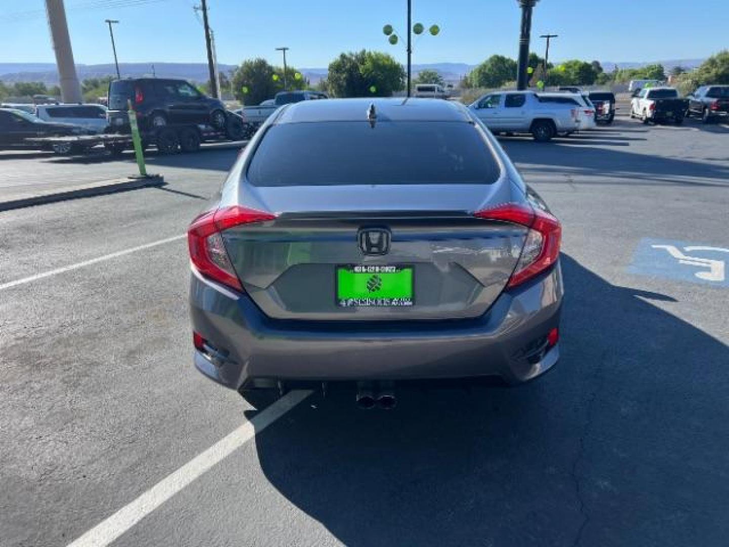 2016 Modern Steel Metallic /Black, cloth Honda Civic EX-T Sedan CVT (19XFC1F38GE) with an 1.5L L4 DOHC 16V TURBO engine, Continuously Variable Transmission transmission, located at 1865 East Red Hills Pkwy, St. George, 84770, (435) 628-0023, 37.120850, -113.543640 - We specialize in helping ALL people get the best financing available. No matter your credit score, good, bad or none we can get you an amazing rate. Had a bankruptcy, divorce, or repossessions? We give you the green light to get your credit back on the road. Low down and affordable payments that fit - Photo#6