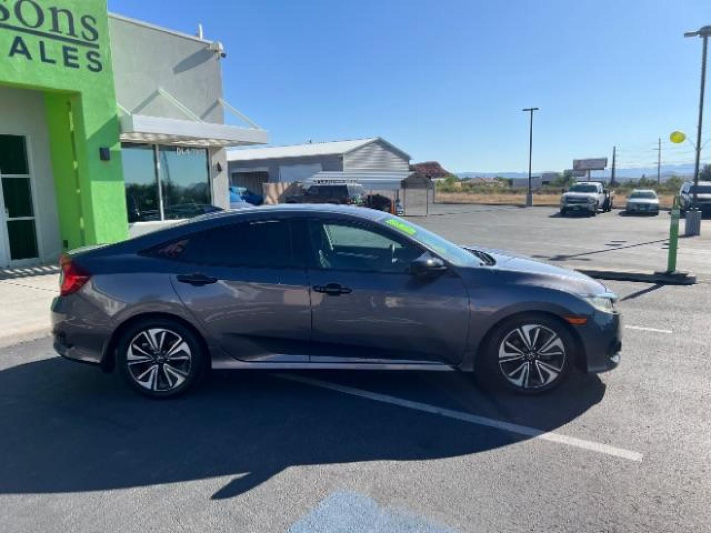 2016 Modern Steel Metallic /Black, cloth Honda Civic EX-T Sedan CVT (19XFC1F38GE) with an 1.5L L4 DOHC 16V TURBO engine, Continuously Variable Transmission transmission, located at 1865 East Red Hills Pkwy, St. George, 84770, (435) 628-0023, 37.120850, -113.543640 - We specialize in helping ALL people get the best financing available. No matter your credit score, good, bad or none we can get you an amazing rate. Had a bankruptcy, divorce, or repossessions? We give you the green light to get your credit back on the road. Low down and affordable payments that fit - Photo#7