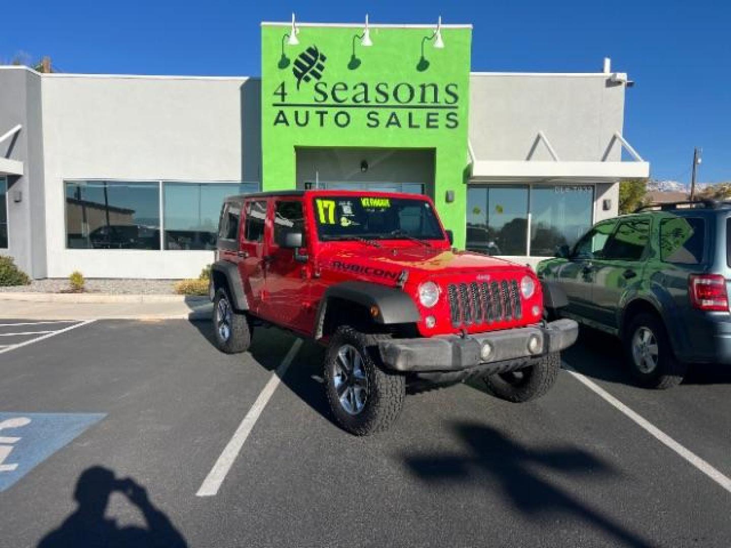 2017 Firecracker Red Clear Coat /Black, cloth Jeep Wrangler Unlimited Sport 4WD (1C4BJWDG2HL) with an 3.6L V6 DOHC 24V FFV engine, 5-Speed Automatic transmission, located at 1865 East Red Hills Pkwy, St. George, 84770, (435) 628-0023, 37.120850, -113.543640 - We specialize in helping ALL people get the best financing available. No matter your credit score, good, bad or none we can get you an amazing rate. Had a bankruptcy, divorce, or repossessions? We give you the green light to get your credit back on the road. Low down and affordable payments that fit - Photo#0