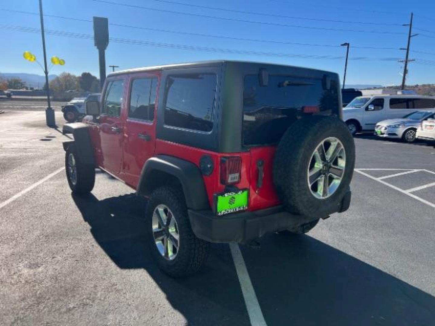 2017 Firecracker Red Clear Coat /Black, cloth Jeep Wrangler Unlimited Sport 4WD (1C4BJWDG2HL) with an 3.6L V6 DOHC 24V FFV engine, 5-Speed Automatic transmission, located at 1865 East Red Hills Pkwy, St. George, 84770, (435) 628-0023, 37.120850, -113.543640 - We specialize in helping ALL people get the best financing available. No matter your credit score, good, bad or none we can get you an amazing rate. Had a bankruptcy, divorce, or repossessions? We give you the green light to get your credit back on the road. Low down and affordable payments that fit - Photo#4