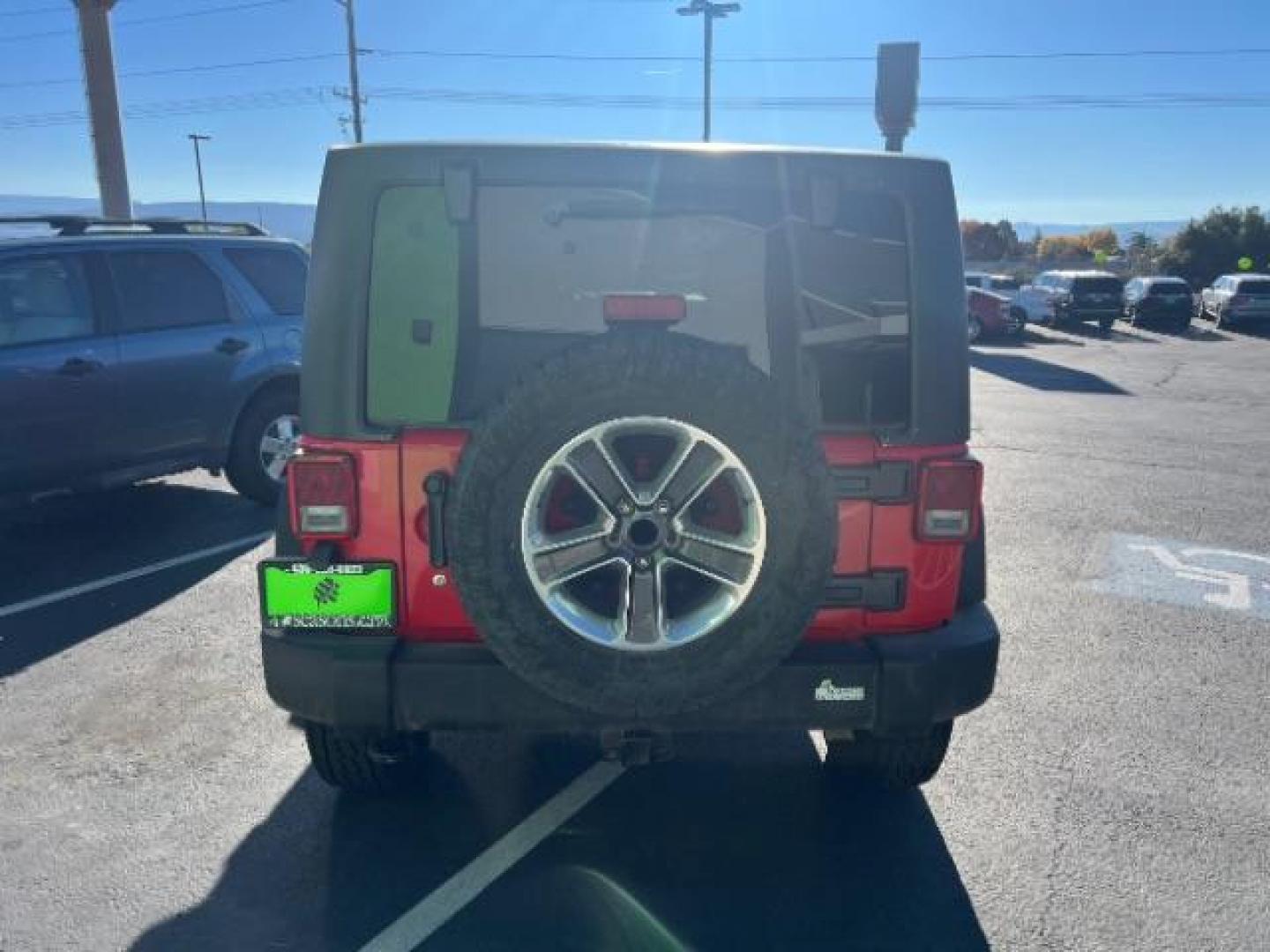 2017 Firecracker Red Clear Coat /Black, cloth Jeep Wrangler Unlimited Sport 4WD (1C4BJWDG2HL) with an 3.6L V6 DOHC 24V FFV engine, 5-Speed Automatic transmission, located at 1865 East Red Hills Pkwy, St. George, 84770, (435) 628-0023, 37.120850, -113.543640 - We specialize in helping ALL people get the best financing available. No matter your credit score, good, bad or none we can get you an amazing rate. Had a bankruptcy, divorce, or repossessions? We give you the green light to get your credit back on the road. Low down and affordable payments that fit - Photo#5