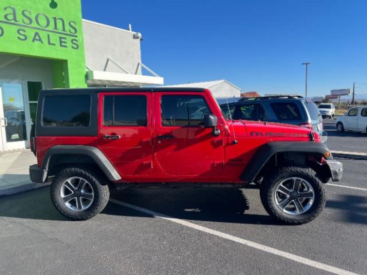 2017 Firecracker Red Clear Coat /Black, cloth Jeep Wrangler Unlimited Sport 4WD (1C4BJWDG2HL) with an 3.6L V6 DOHC 24V FFV engine, 5-Speed Automatic transmission, located at 1865 East Red Hills Pkwy, St. George, 84770, (435) 628-0023, 37.120850, -113.543640 - We specialize in helping ALL people get the best financing available. No matter your credit score, good, bad or none we can get you an amazing rate. Had a bankruptcy, divorce, or repossessions? We give you the green light to get your credit back on the road. Low down and affordable payments that fit - Photo#7