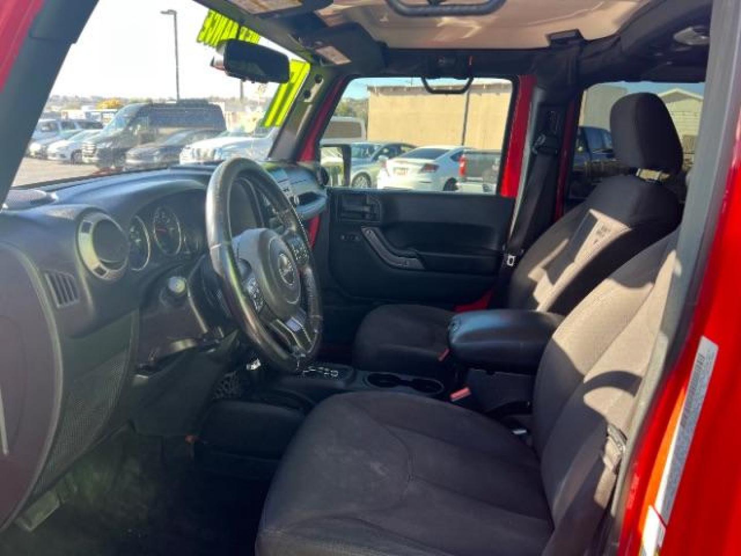 2017 Firecracker Red Clear Coat /Black, cloth Jeep Wrangler Unlimited Sport 4WD (1C4BJWDG2HL) with an 3.6L V6 DOHC 24V FFV engine, 5-Speed Automatic transmission, located at 1865 East Red Hills Pkwy, St. George, 84770, (435) 628-0023, 37.120850, -113.543640 - We specialize in helping ALL people get the best financing available. No matter your credit score, good, bad or none we can get you an amazing rate. Had a bankruptcy, divorce, or repossessions? We give you the green light to get your credit back on the road. Low down and affordable payments that fit - Photo#14