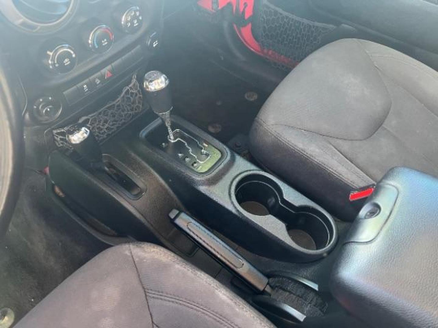 2017 Firecracker Red Clear Coat /Black, cloth Jeep Wrangler Unlimited Sport 4WD (1C4BJWDG2HL) with an 3.6L V6 DOHC 24V FFV engine, 5-Speed Automatic transmission, located at 1865 East Red Hills Pkwy, St. George, 84770, (435) 628-0023, 37.120850, -113.543640 - We specialize in helping ALL people get the best financing available. No matter your credit score, good, bad or none we can get you an amazing rate. Had a bankruptcy, divorce, or repossessions? We give you the green light to get your credit back on the road. Low down and affordable payments that fit - Photo#18