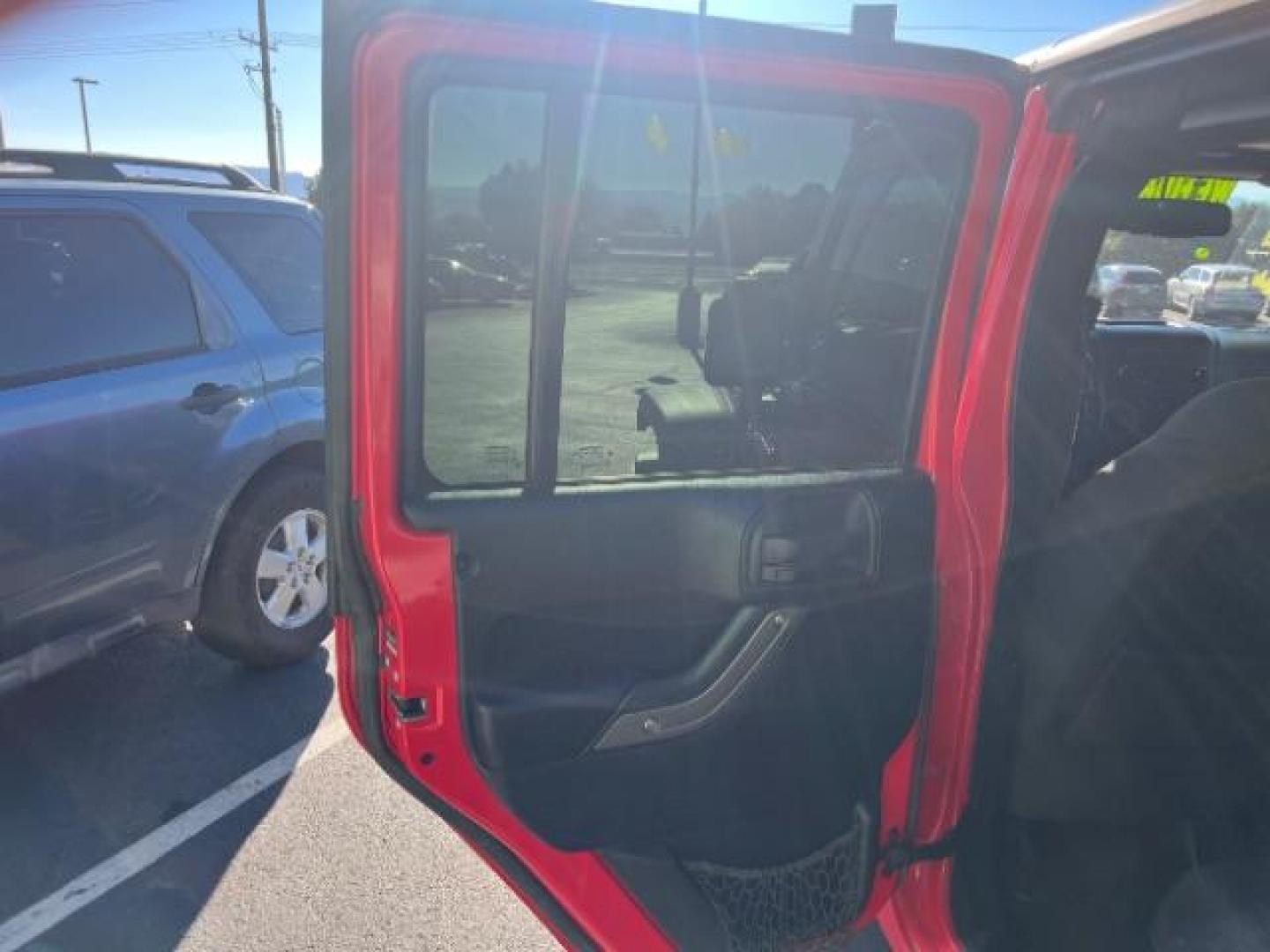 2017 Firecracker Red Clear Coat /Black, cloth Jeep Wrangler Unlimited Sport 4WD (1C4BJWDG2HL) with an 3.6L V6 DOHC 24V FFV engine, 5-Speed Automatic transmission, located at 1865 East Red Hills Pkwy, St. George, 84770, (435) 628-0023, 37.120850, -113.543640 - We specialize in helping ALL people get the best financing available. No matter your credit score, good, bad or none we can get you an amazing rate. Had a bankruptcy, divorce, or repossessions? We give you the green light to get your credit back on the road. Low down and affordable payments that fit - Photo#20