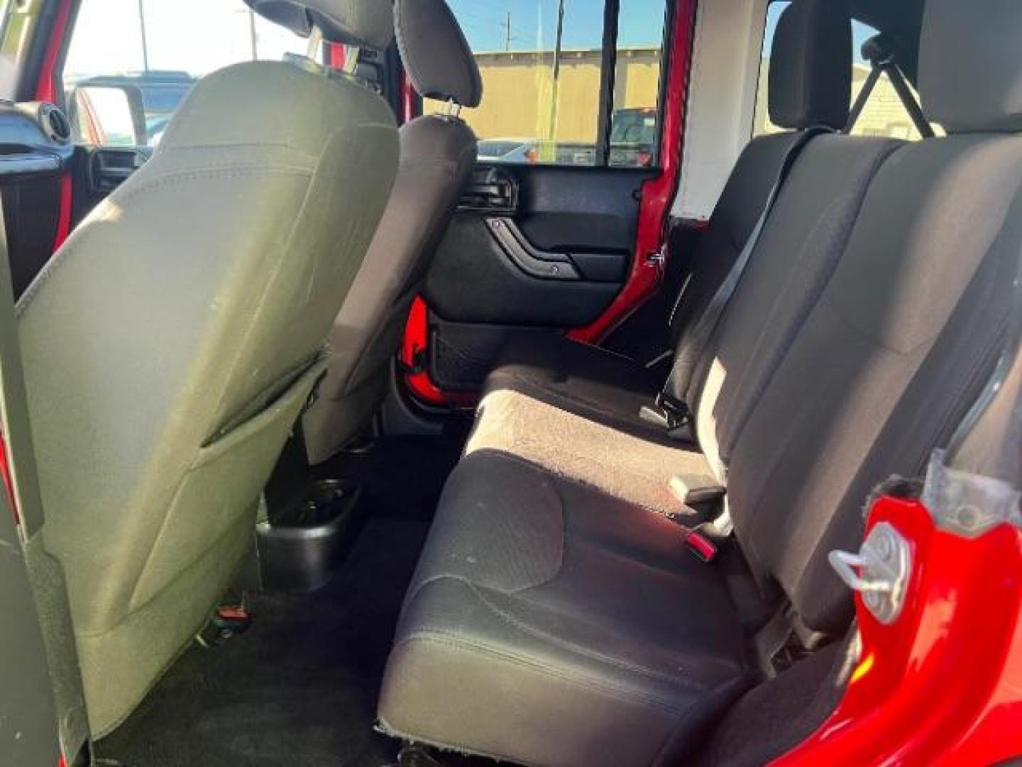 2017 Firecracker Red Clear Coat /Black, cloth Jeep Wrangler Unlimited Sport 4WD (1C4BJWDG2HL) with an 3.6L V6 DOHC 24V FFV engine, 5-Speed Automatic transmission, located at 1865 East Red Hills Pkwy, St. George, 84770, (435) 628-0023, 37.120850, -113.543640 - We specialize in helping ALL people get the best financing available. No matter your credit score, good, bad or none we can get you an amazing rate. Had a bankruptcy, divorce, or repossessions? We give you the green light to get your credit back on the road. Low down and affordable payments that fit - Photo#21