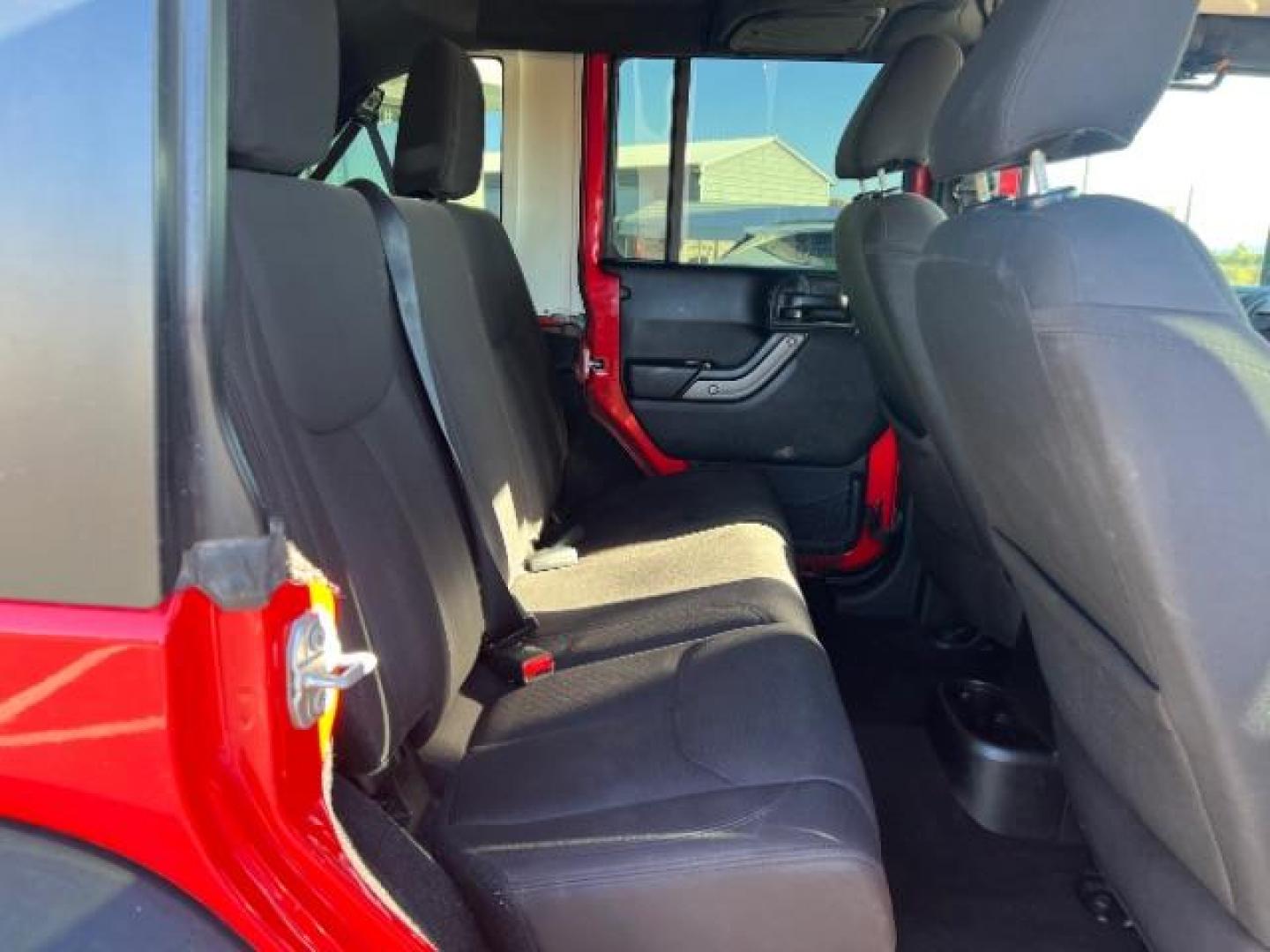 2017 Firecracker Red Clear Coat /Black, cloth Jeep Wrangler Unlimited Sport 4WD (1C4BJWDG2HL) with an 3.6L V6 DOHC 24V FFV engine, 5-Speed Automatic transmission, located at 1865 East Red Hills Pkwy, St. George, 84770, (435) 628-0023, 37.120850, -113.543640 - We specialize in helping ALL people get the best financing available. No matter your credit score, good, bad or none we can get you an amazing rate. Had a bankruptcy, divorce, or repossessions? We give you the green light to get your credit back on the road. Low down and affordable payments that fit - Photo#27