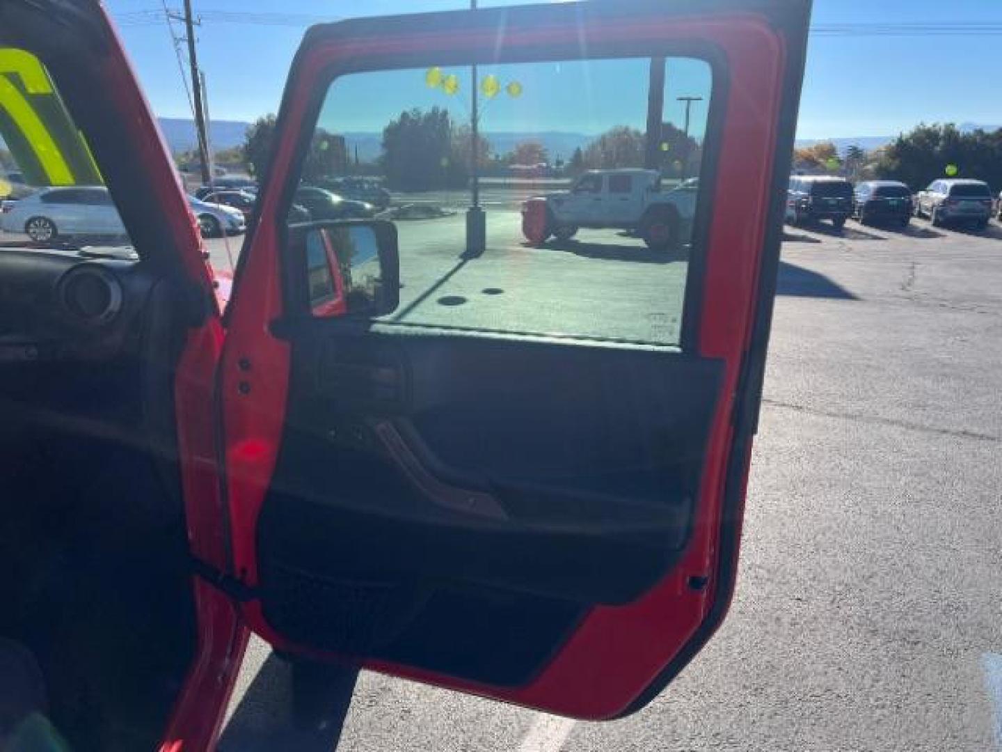 2017 Firecracker Red Clear Coat /Black, cloth Jeep Wrangler Unlimited Sport 4WD (1C4BJWDG2HL) with an 3.6L V6 DOHC 24V FFV engine, 5-Speed Automatic transmission, located at 1865 East Red Hills Pkwy, St. George, 84770, (435) 628-0023, 37.120850, -113.543640 - We specialize in helping ALL people get the best financing available. No matter your credit score, good, bad or none we can get you an amazing rate. Had a bankruptcy, divorce, or repossessions? We give you the green light to get your credit back on the road. Low down and affordable payments that fit - Photo#28