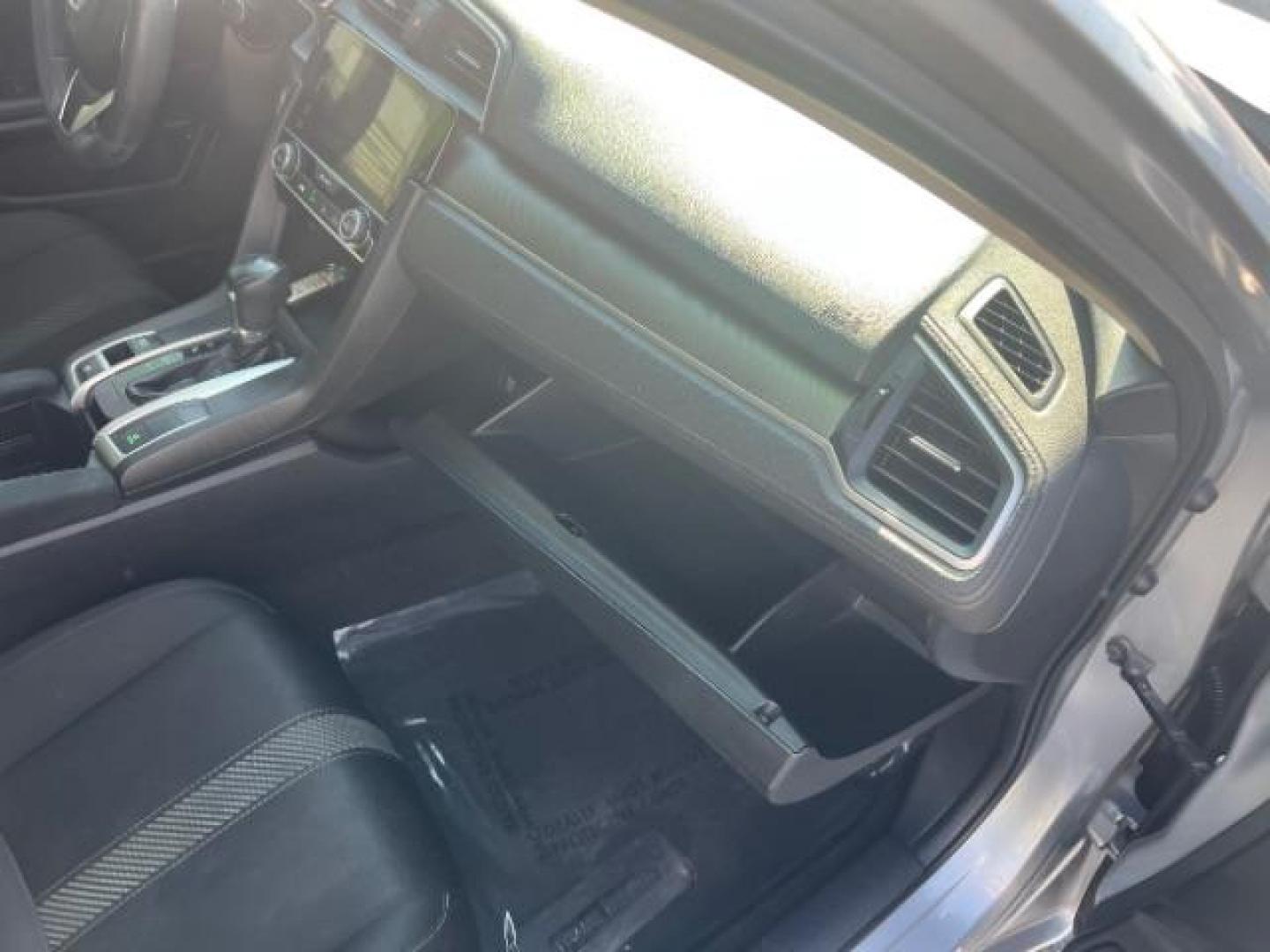 2016 Lunar Silver Metallic /Black, cloth Honda Civic EX Sedan CVT (2HGFC2F78GH) with an 2.0L L4 DOHC 16V engine, Continuously Variable Transmission transmission, located at 1865 East Red Hills Pkwy, St. George, 84770, (435) 628-0023, 37.120850, -113.543640 - We specialize in helping ALL people get the best financing available. No matter your credit score, good, bad or none we can get you an amazing rate. Had a bankruptcy, divorce, or repossessions? We give you the green light to get your credit back on the road. Low down and affordable payments that fit - Photo#30