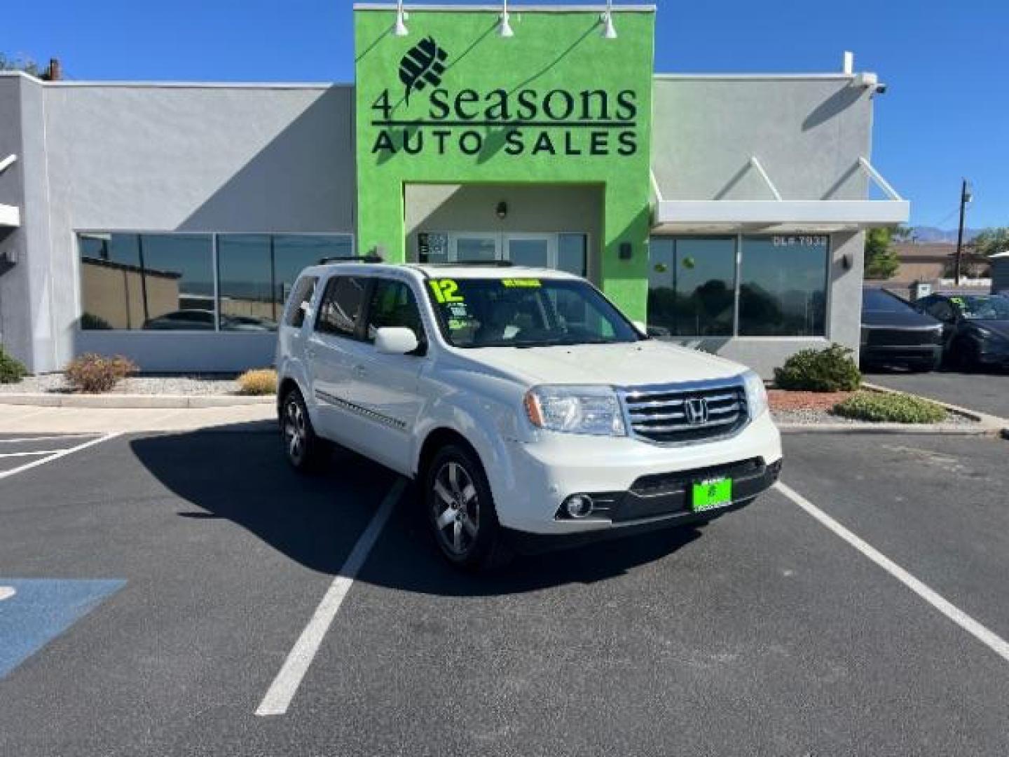 2012 White Diamond Pearl /Gray Leather Interio Honda Pilot Touring 4WD 5-Spd AT (5FNYF4H90CB) with an 3.5L V6 SOHC 24V engine, 5-Speed Automatic transmission, located at 1865 East Red Hills Pkwy, St. George, 84770, (435) 628-0023, 37.120850, -113.543640 - We specialize in helping ALL people get the best financing available. No matter your credit score, good, bad or none we can get you an amazing rate. Had a bankruptcy, divorce, or repossessions? We give you the green light to get your credit back on the road. Low down and affordable payments that fit - Photo#0